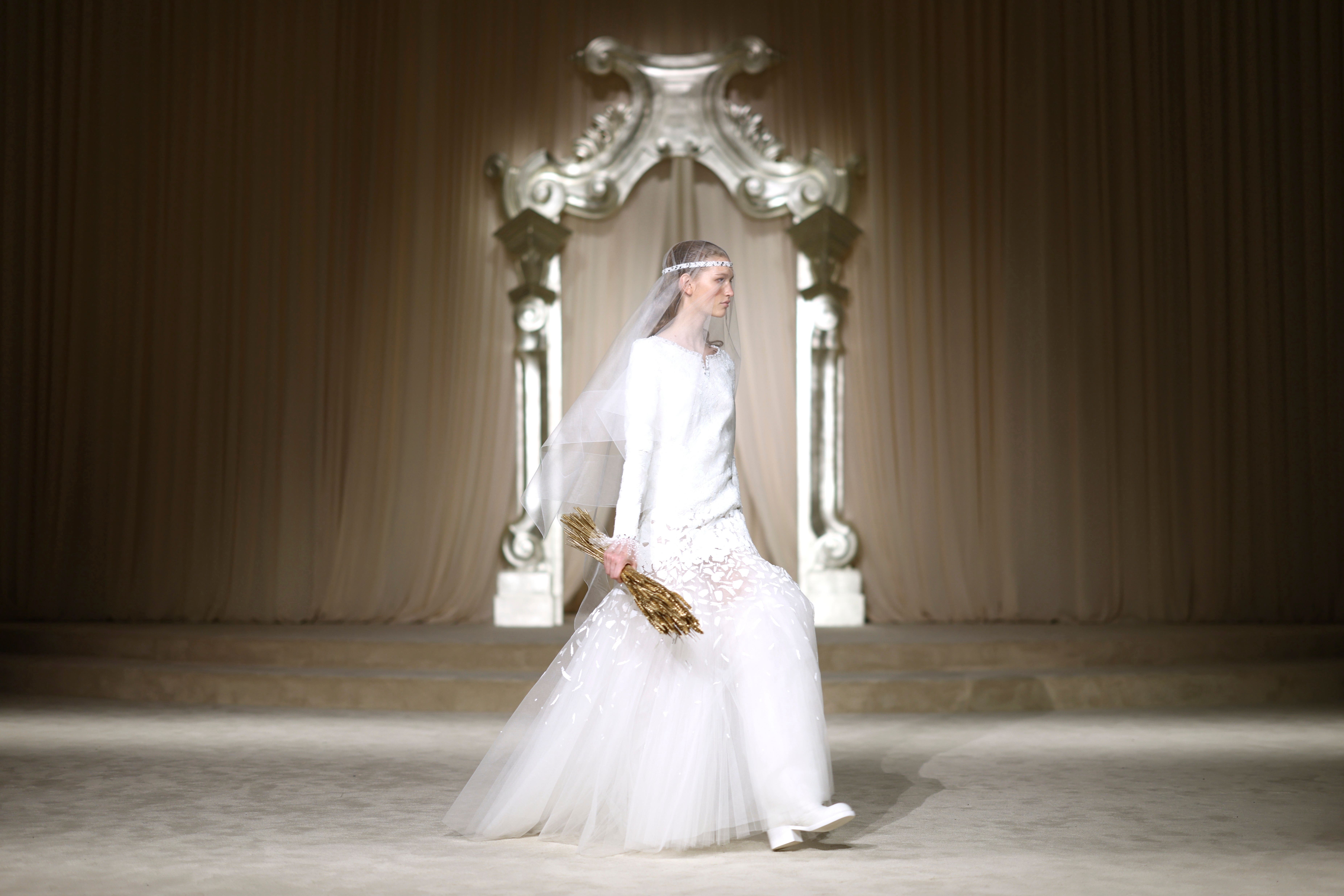 The collection used wheat, a long-standing symbol of prosperity cherished by the founder herself, as a recurring motif throughout (Tom Nicholson/AP)