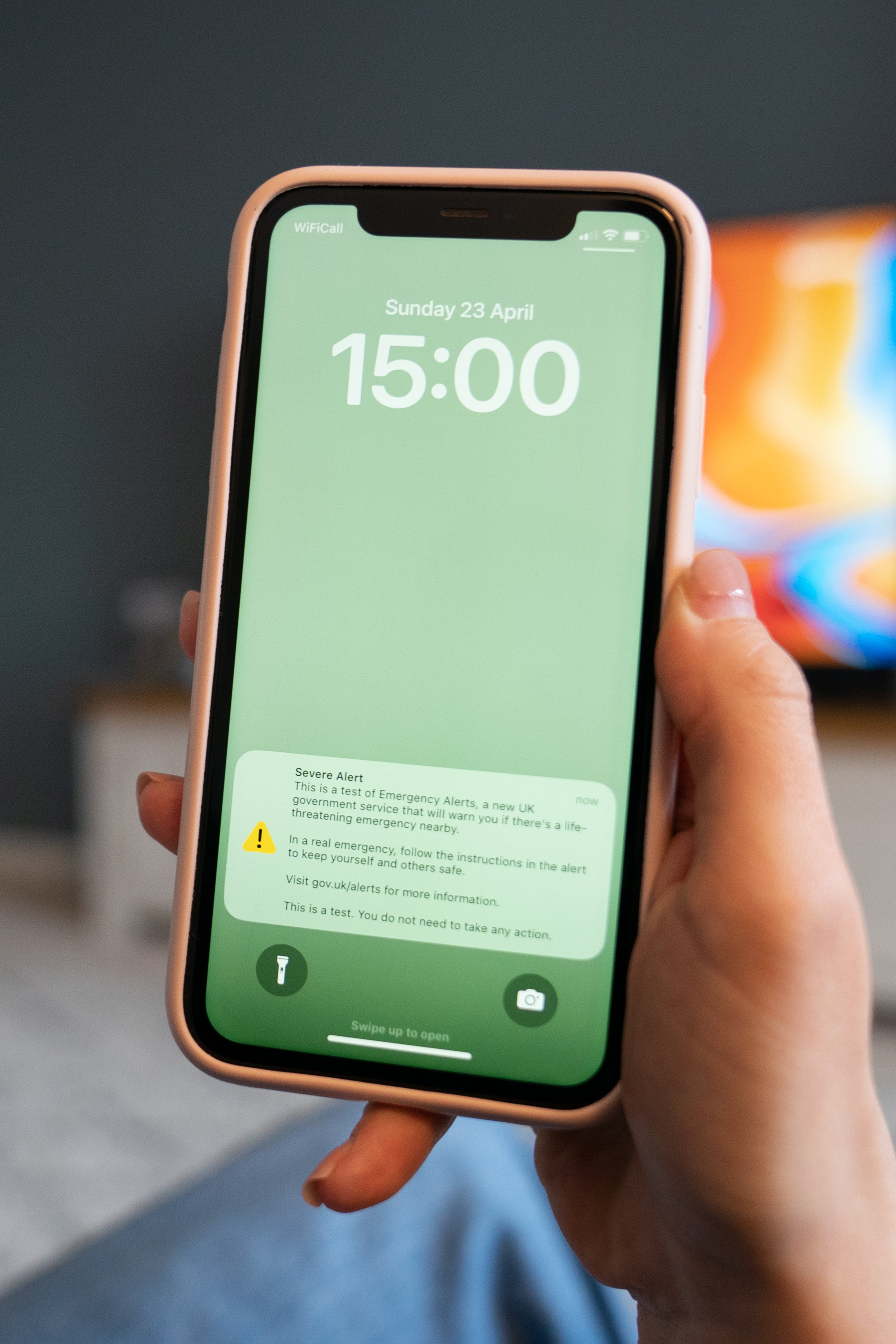 A test of a new public alert system emitting a loud alarm on a mobile phone (Joe Giddens/PA)