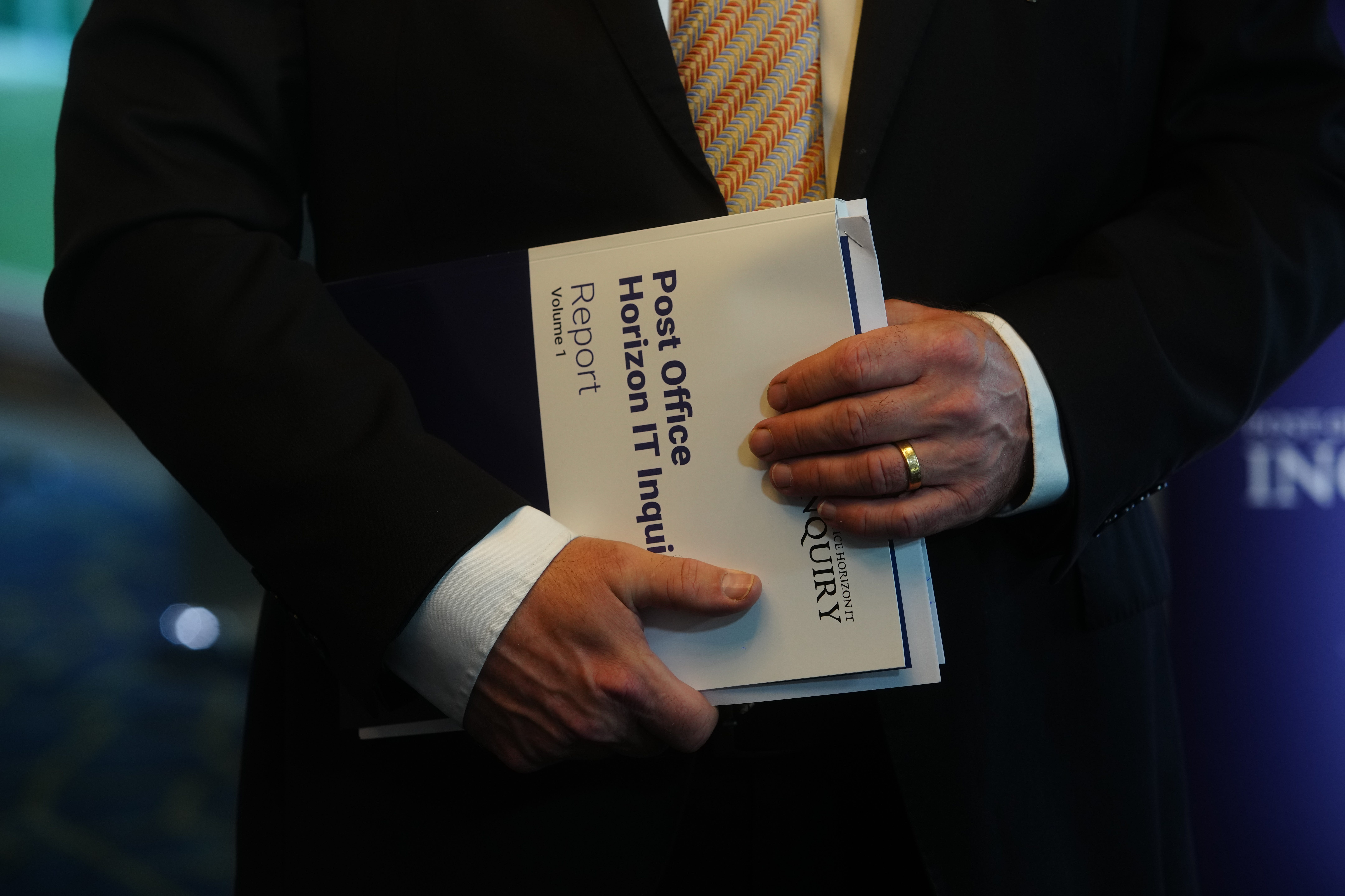 A copy of the first volume of the final report of the Horizon Inquiry (Jeff Moore/PA)
