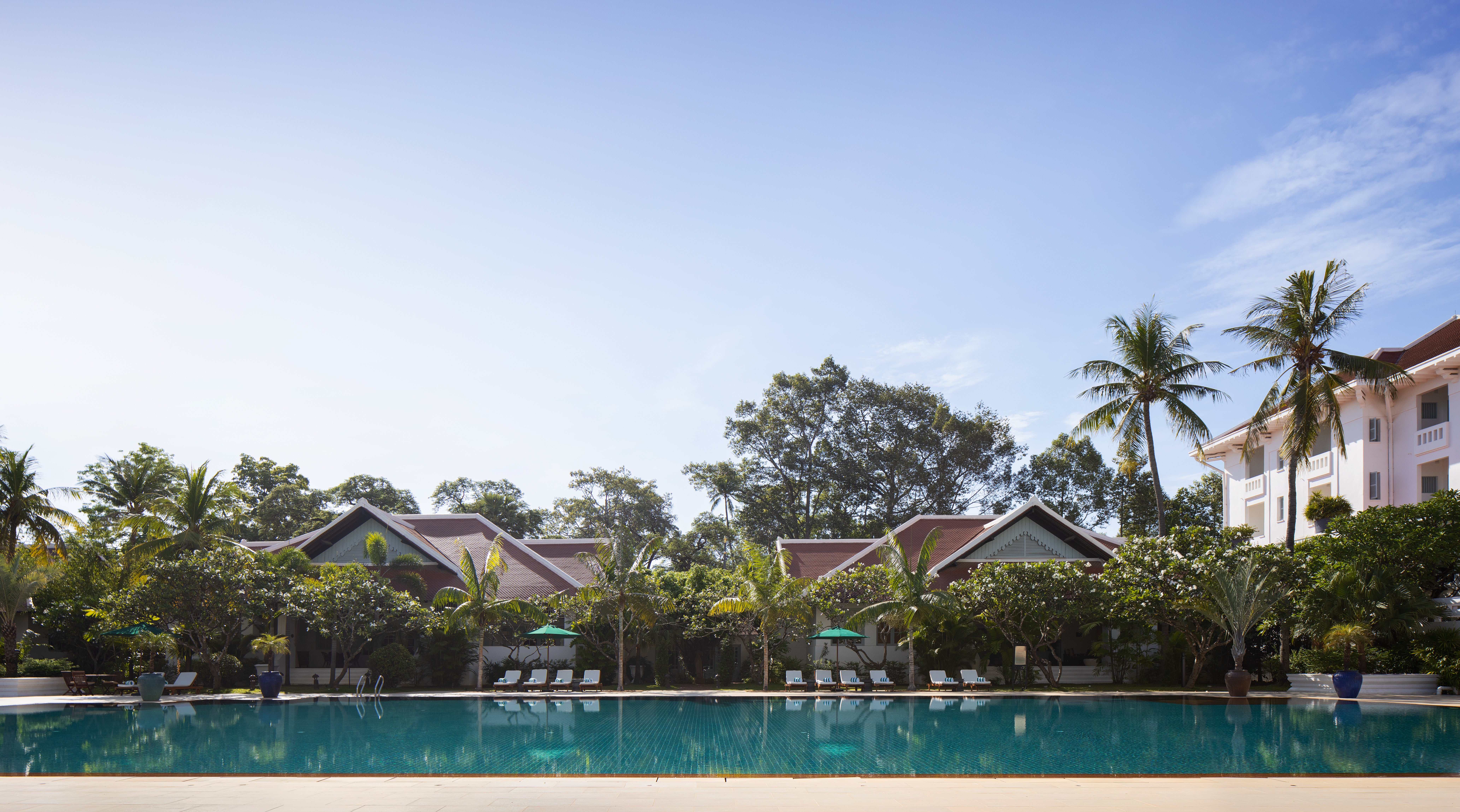 The pool at Raffles Grand Hotel d'Angkor takes inspiration from Angkor’s ancient royal bathing pools