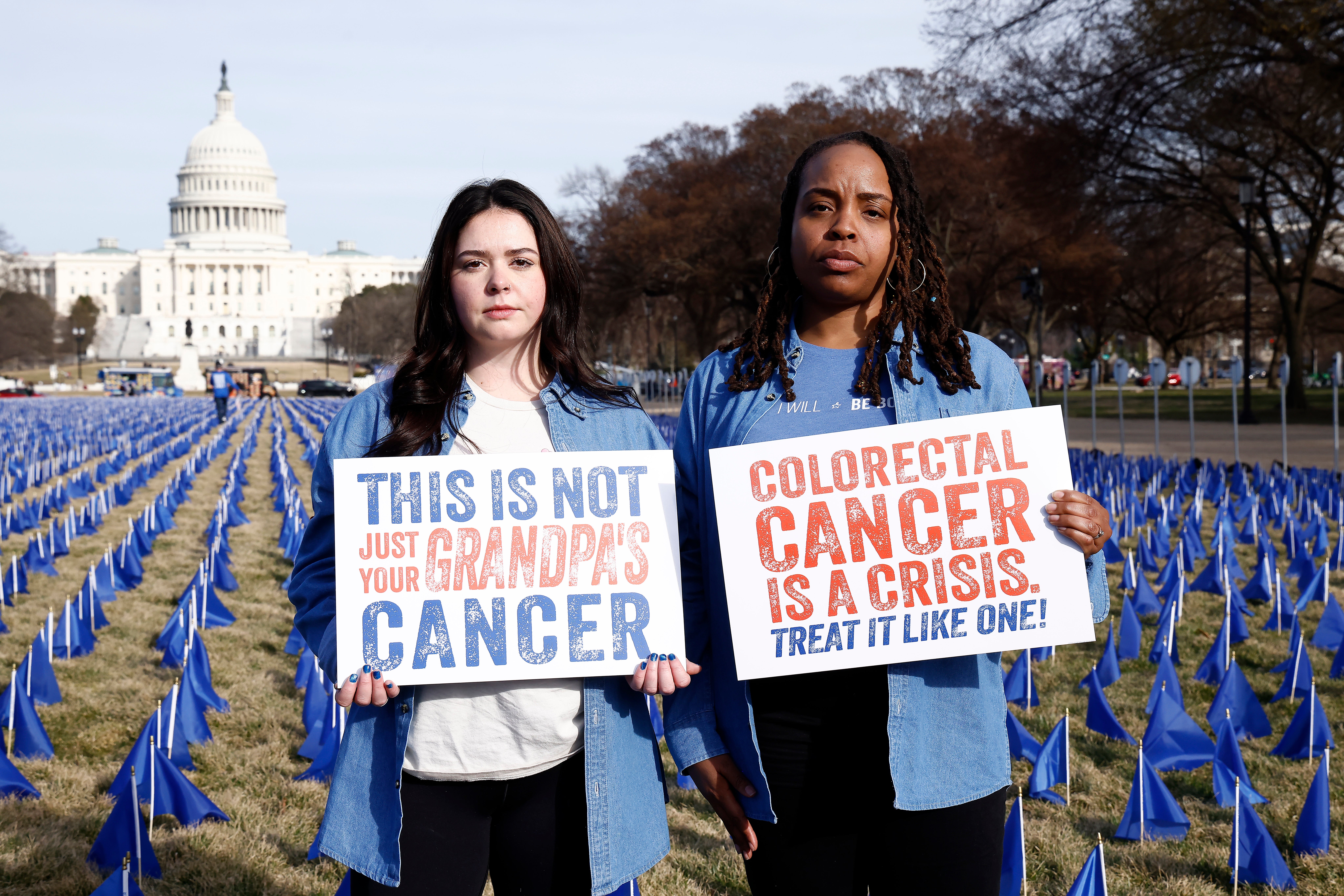 Cancer survivors visit an installation to spotlight the rise in young adult colorectal cancer cases at the the National Mall in Washington, D.C., this year. Colorectal cancer is expected to result in nearly 53,000 deaths this year alone