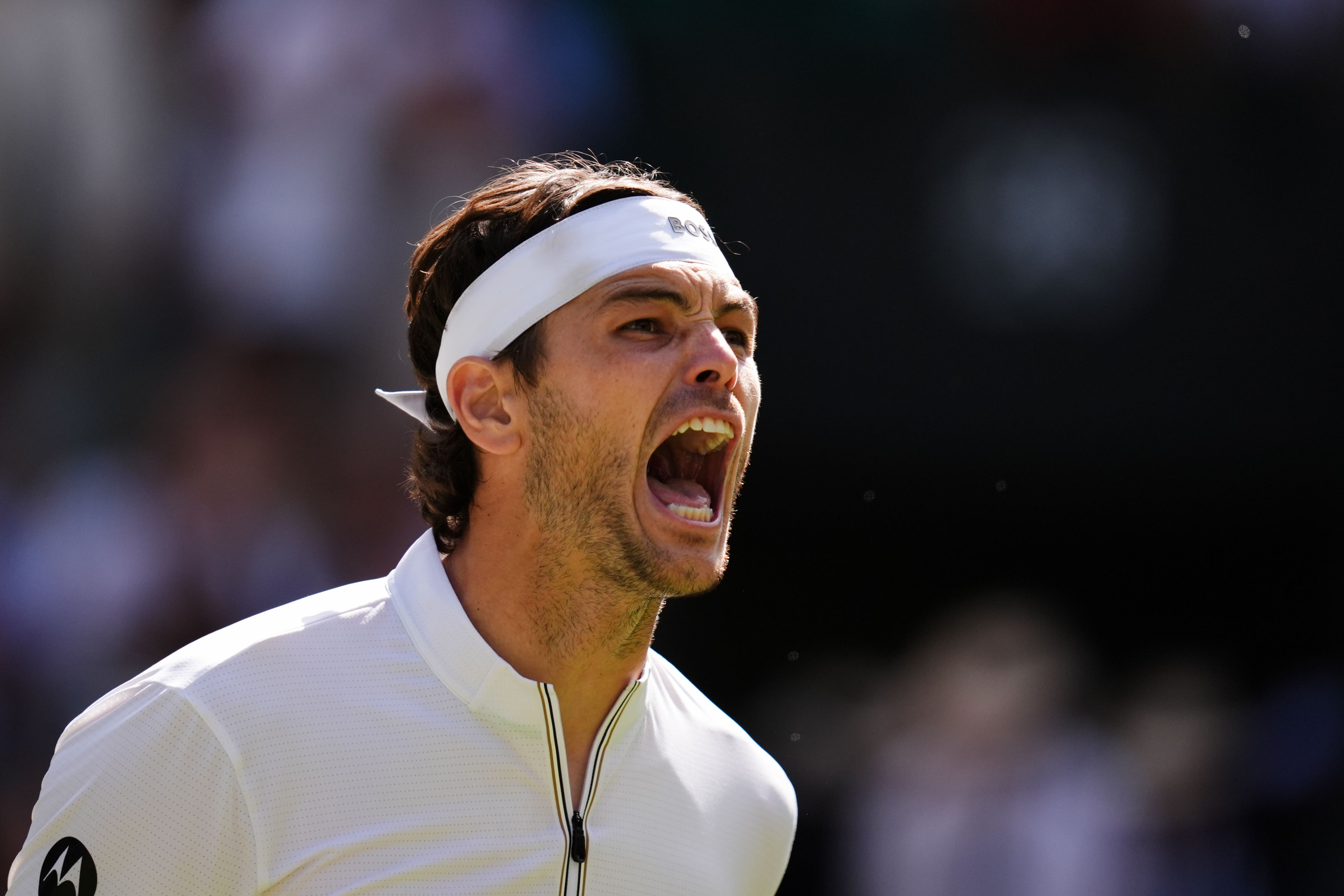 Taylor Fritz celebrates victory over Karen Khachanov (John Walton/PA)