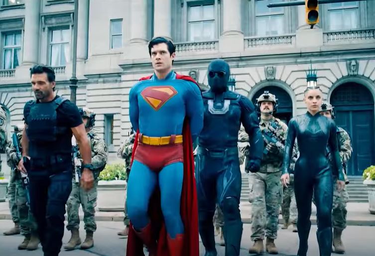 Superman is frogmarched in front of City Hall