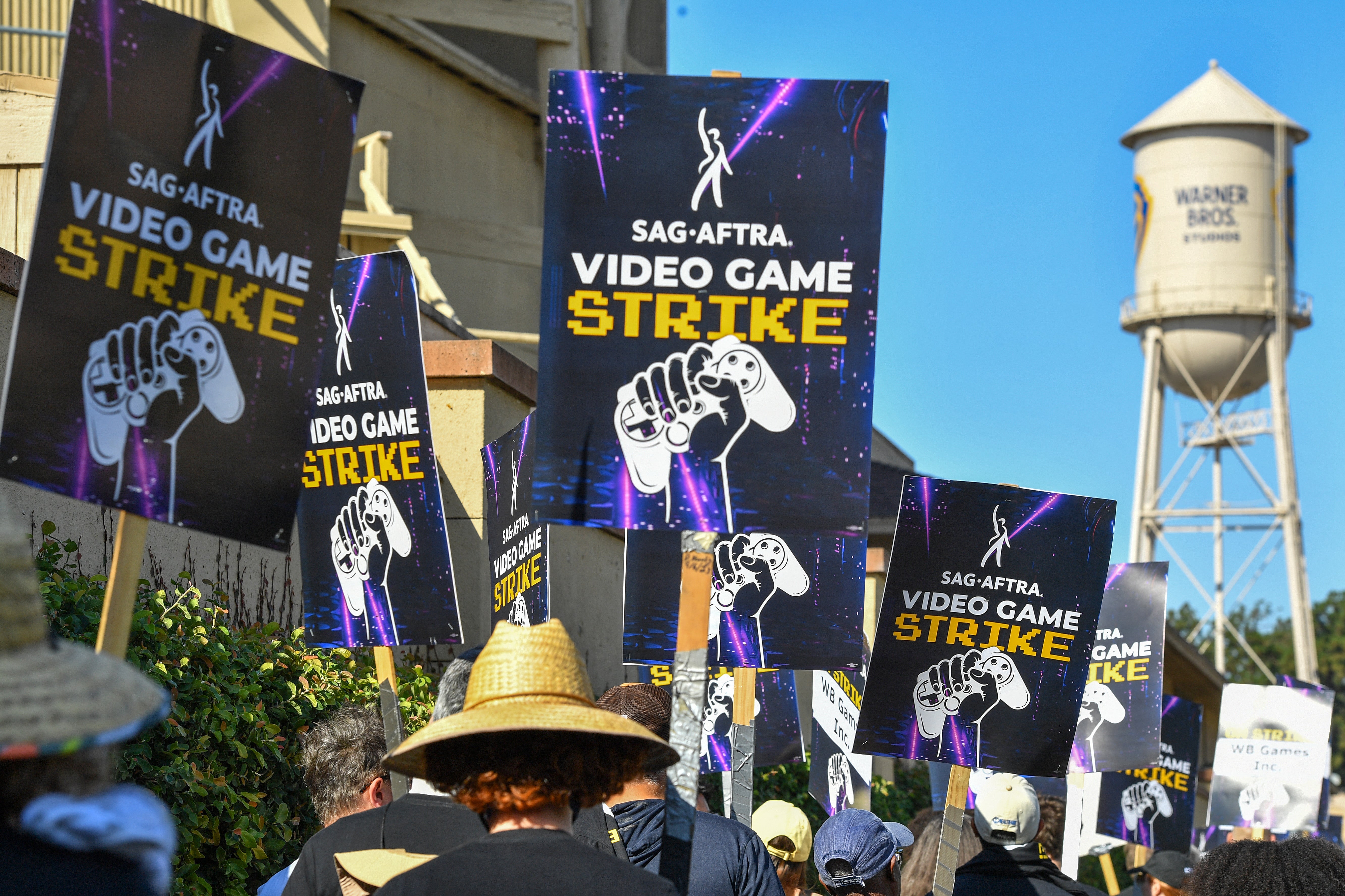 SAG-AFTRA union video game performers strike outside Warner Bros. Games, part of the Global Streaming and Interactive Entertainment unit of Warner Bros. Discovery, in Burbank, California, on August 1, 2024.