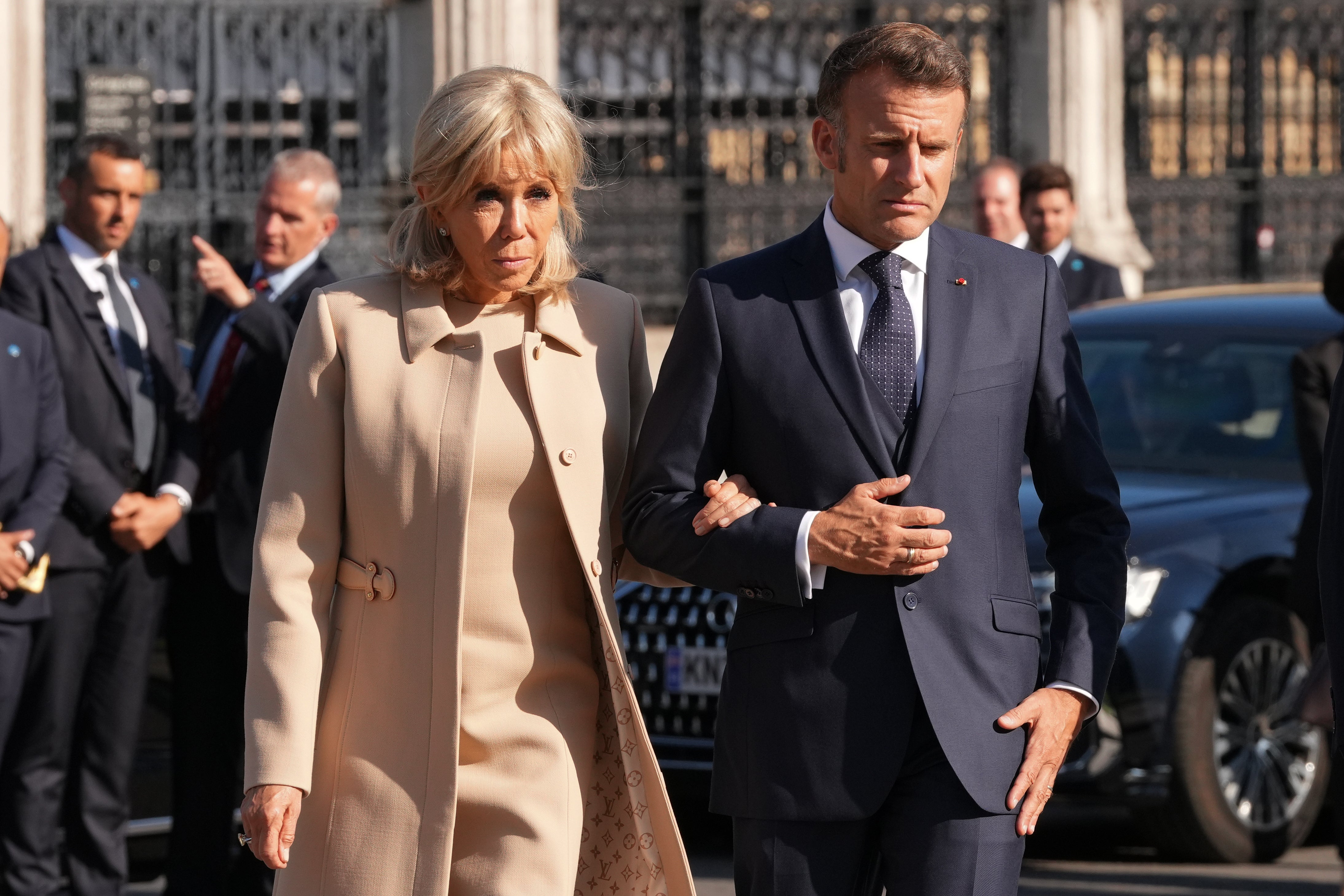 President of France Emmanuel Macron and his wife Brigitte attend a ceremony at the Statue of Sir Winston Churchill in Parliament Square, central London (Carlos Jasso/PA)