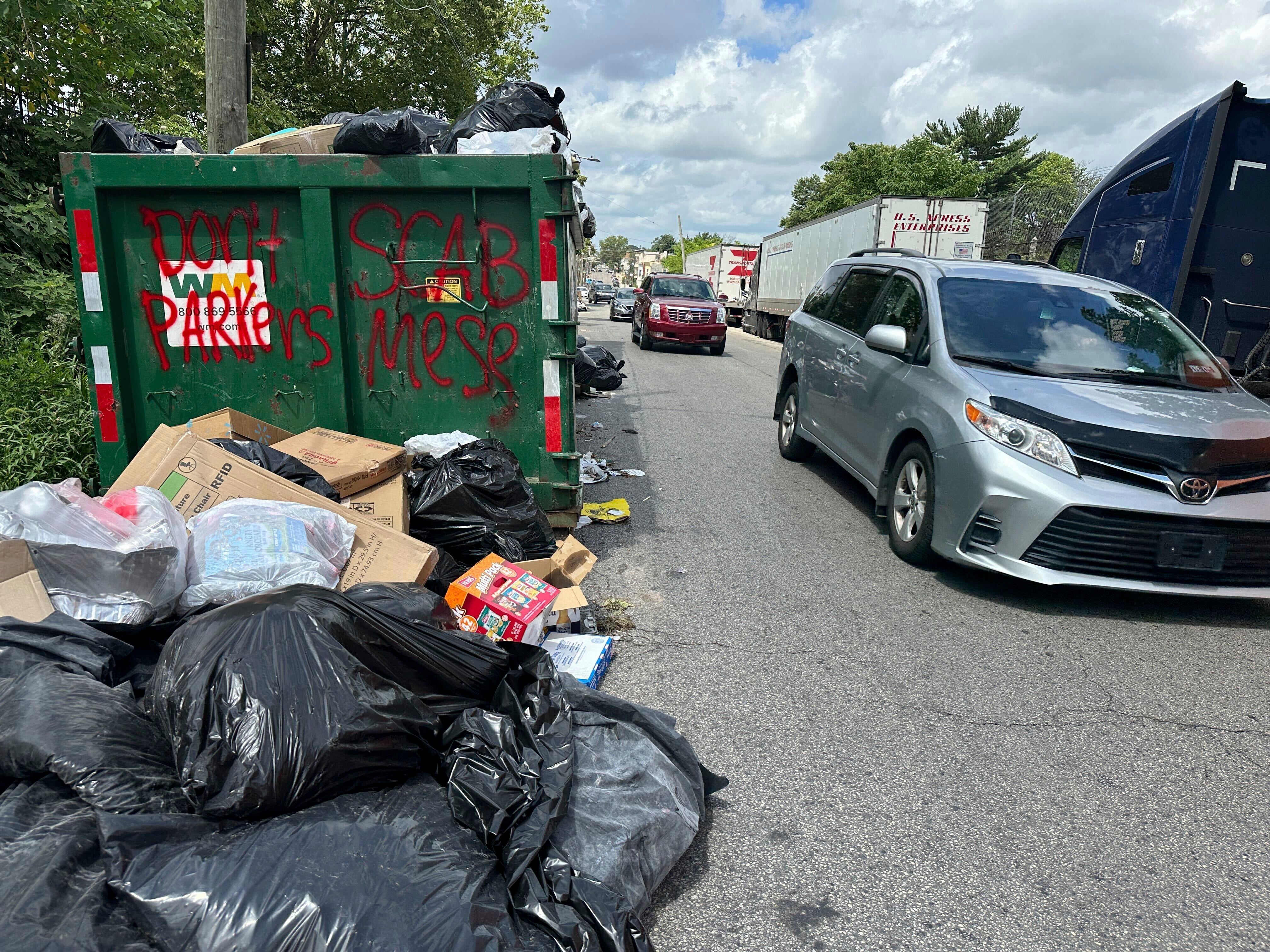 Trash is piling up in Philadelphia as municipal workers enter their second week of a strike seeking higher pay, the largest such stoppage in decades
