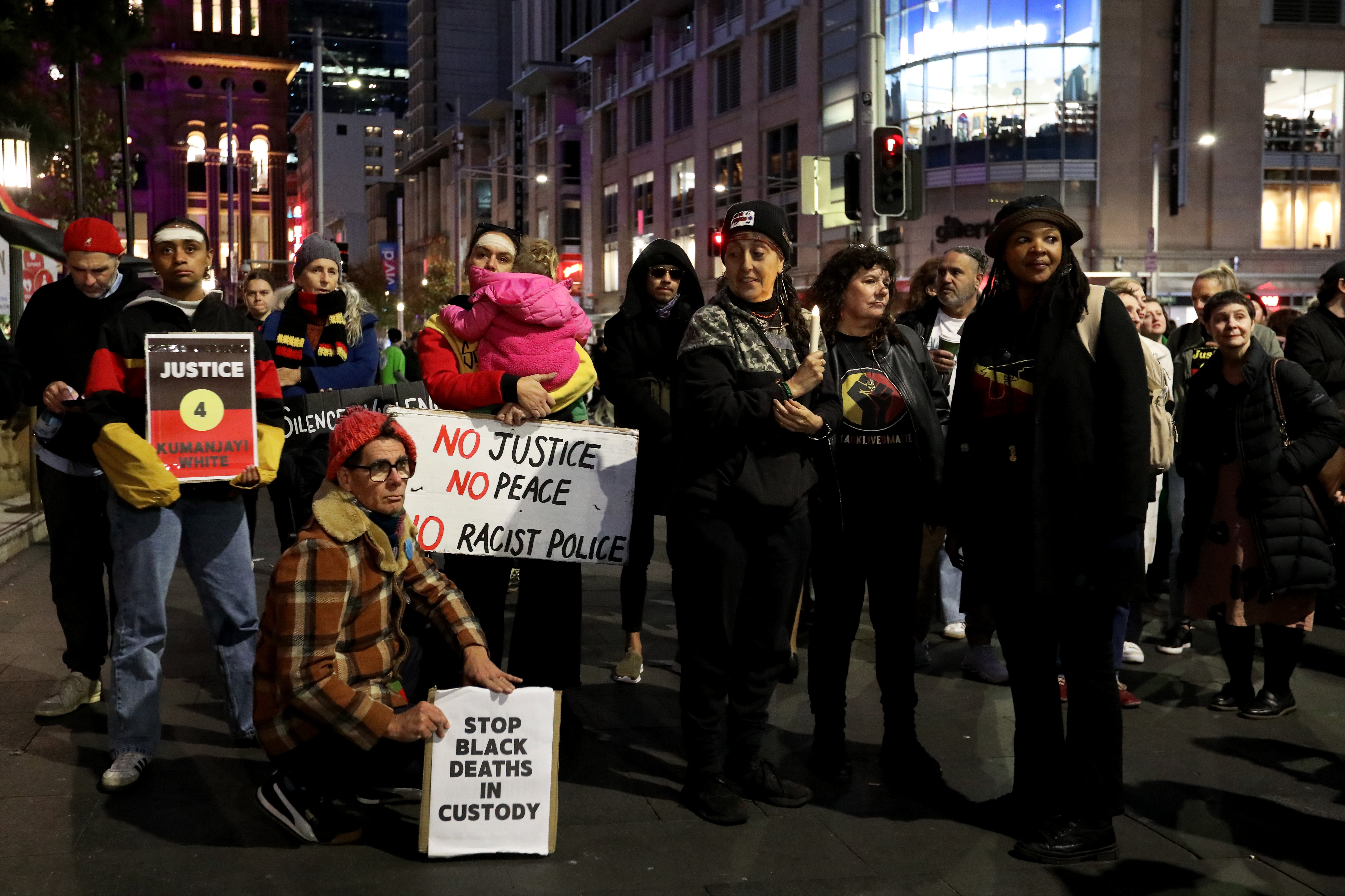 Protesters demand action on Yuendumu deaths in police custody during a rally at Sydney Town Hall on 7 June 2025 in Sydney, Australia. A 24-year-old Warlpiri man, Kumanjayi White, died after being forcibly restrained by two plainclothes police officers at a Coles supermarket in Alice Springs on 27 May 2025, sparking national outrage and calls for an independent investigation into his death