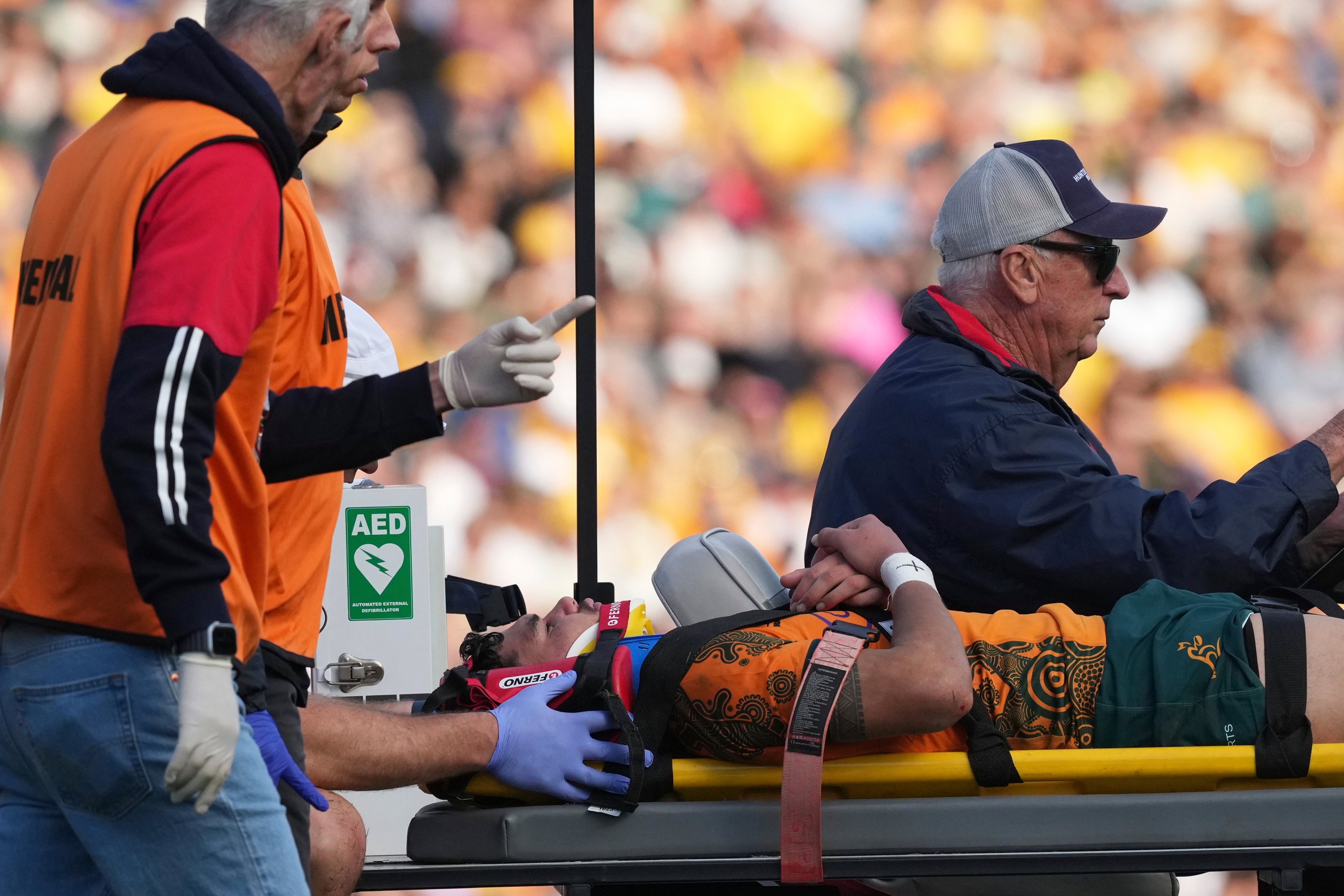 Noah Lolesio was taken off on a stretcher during Australia's win over Fiji