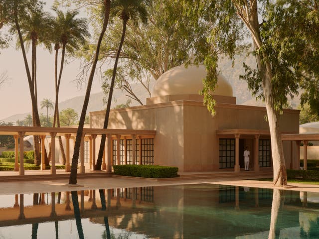 <p>Surrounded by palms and soundtracked by birdsong, you'd be hard pushed to find a more peaceful or picturesque pool than the one at Amanbagh hotel in India </p>