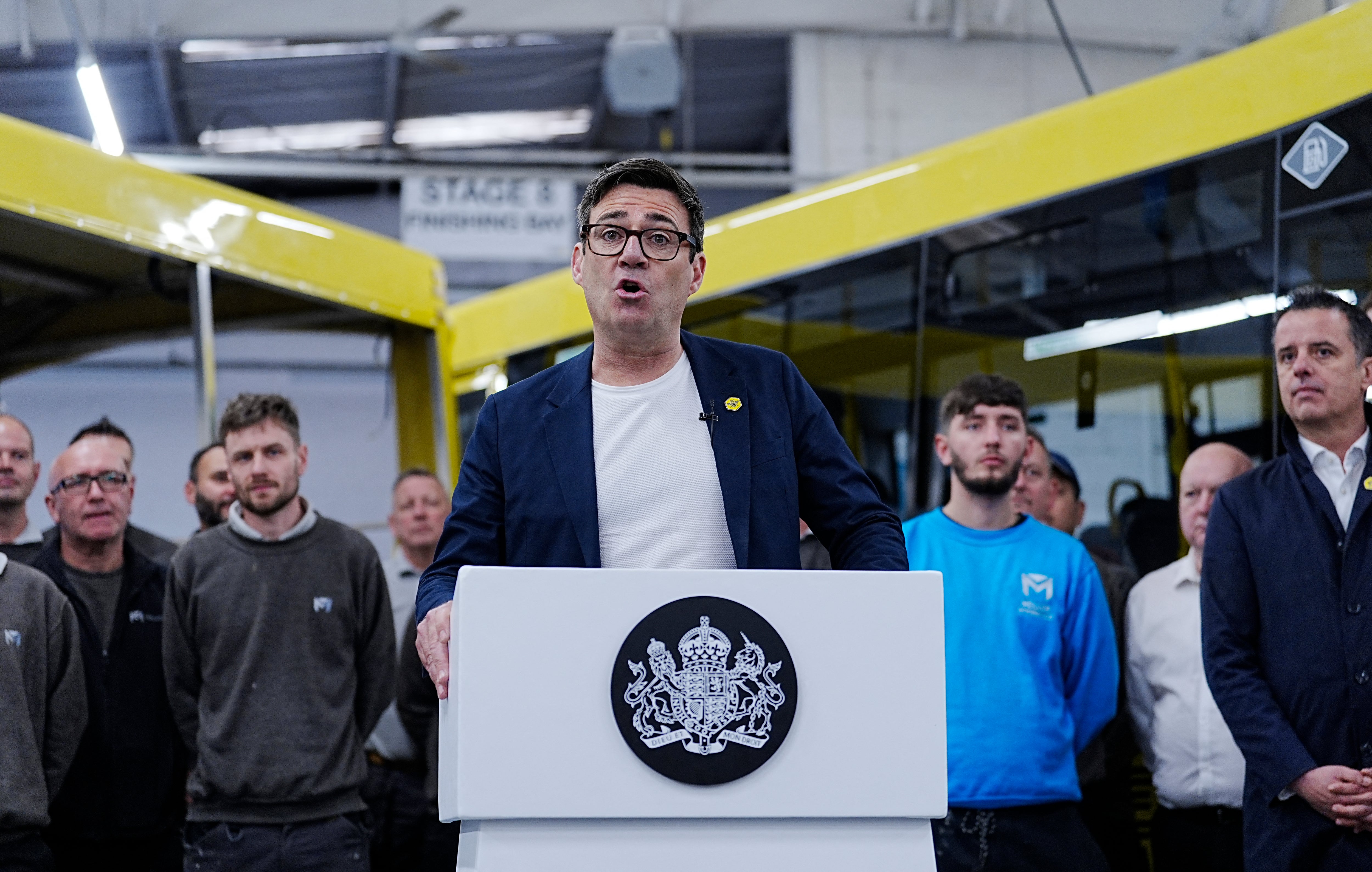 The mayor gives a speech during a visit to the Mellor Bus factory in Rochdale in June