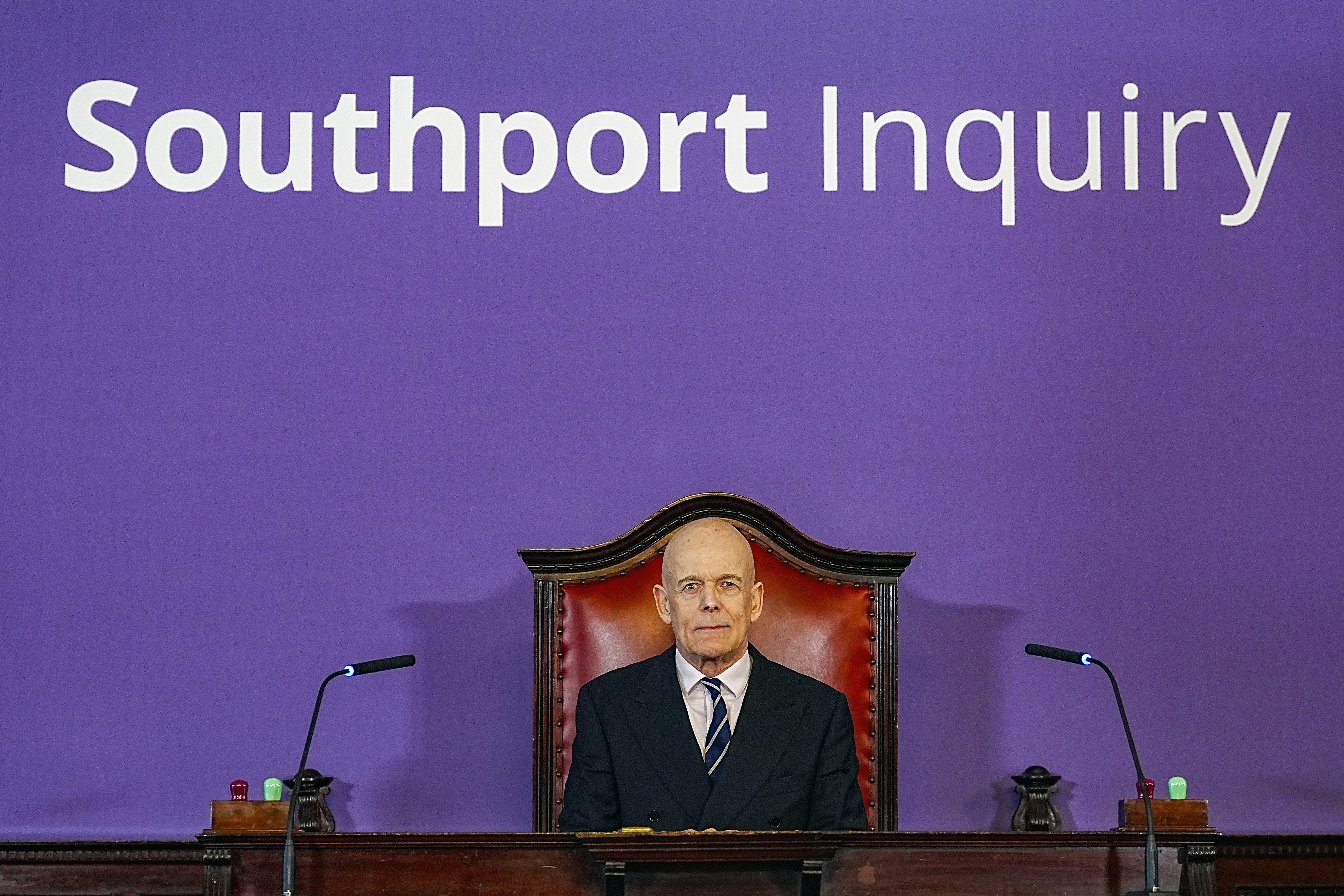 Southport Public Inquiry chairman Sir Adrian Fulford sitting inside the hearing room at Liverpool Town Hall (Peter Byrne/PA)