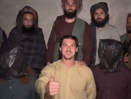In the opening scene, one of the 'captives' gives the thumbs up and says, 'Welcome to Afghanistan!'