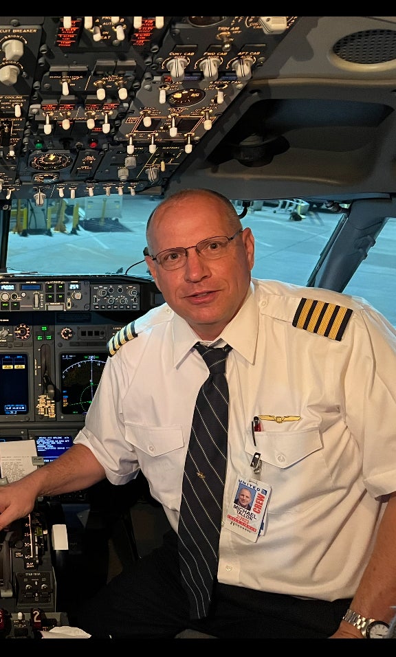 Capt. Michael Tallon fell and suffered a concussion during a layover in the Azores and his life was never the same, he says