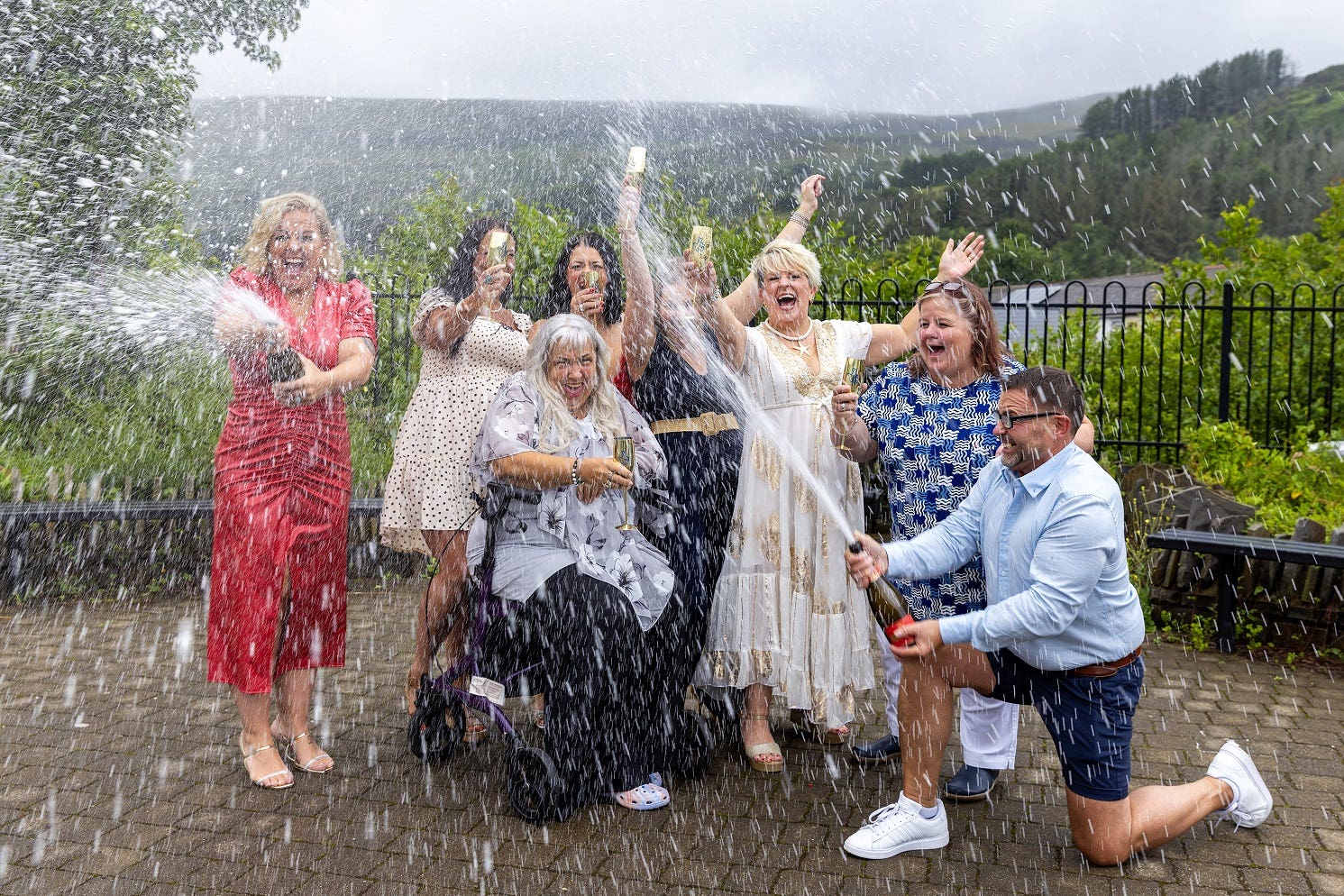 Some of the winning members of the West Is Best Syndicate (Allwyn/PA)