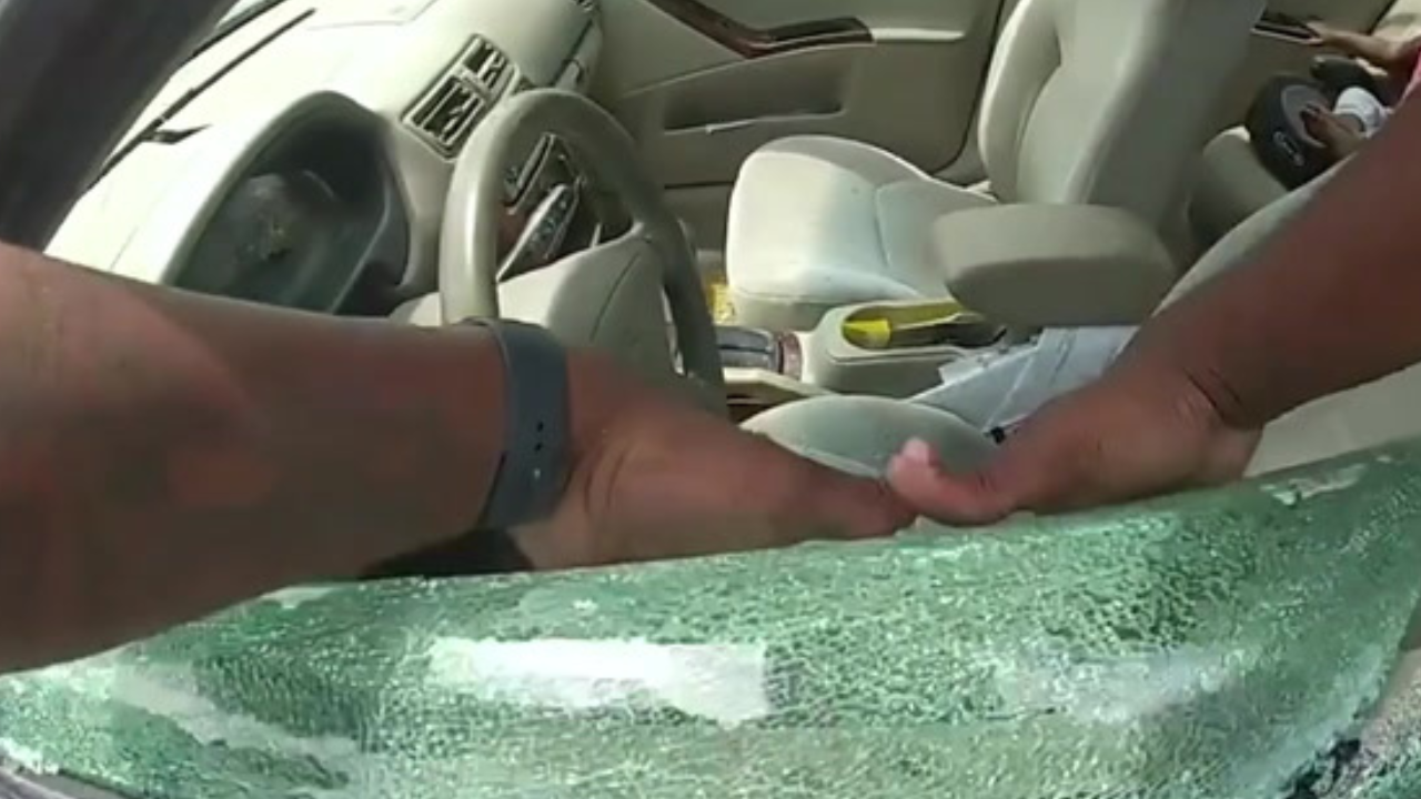 Two toddlers saved from sweltering car after father ‘left them alone for 40 minutes’