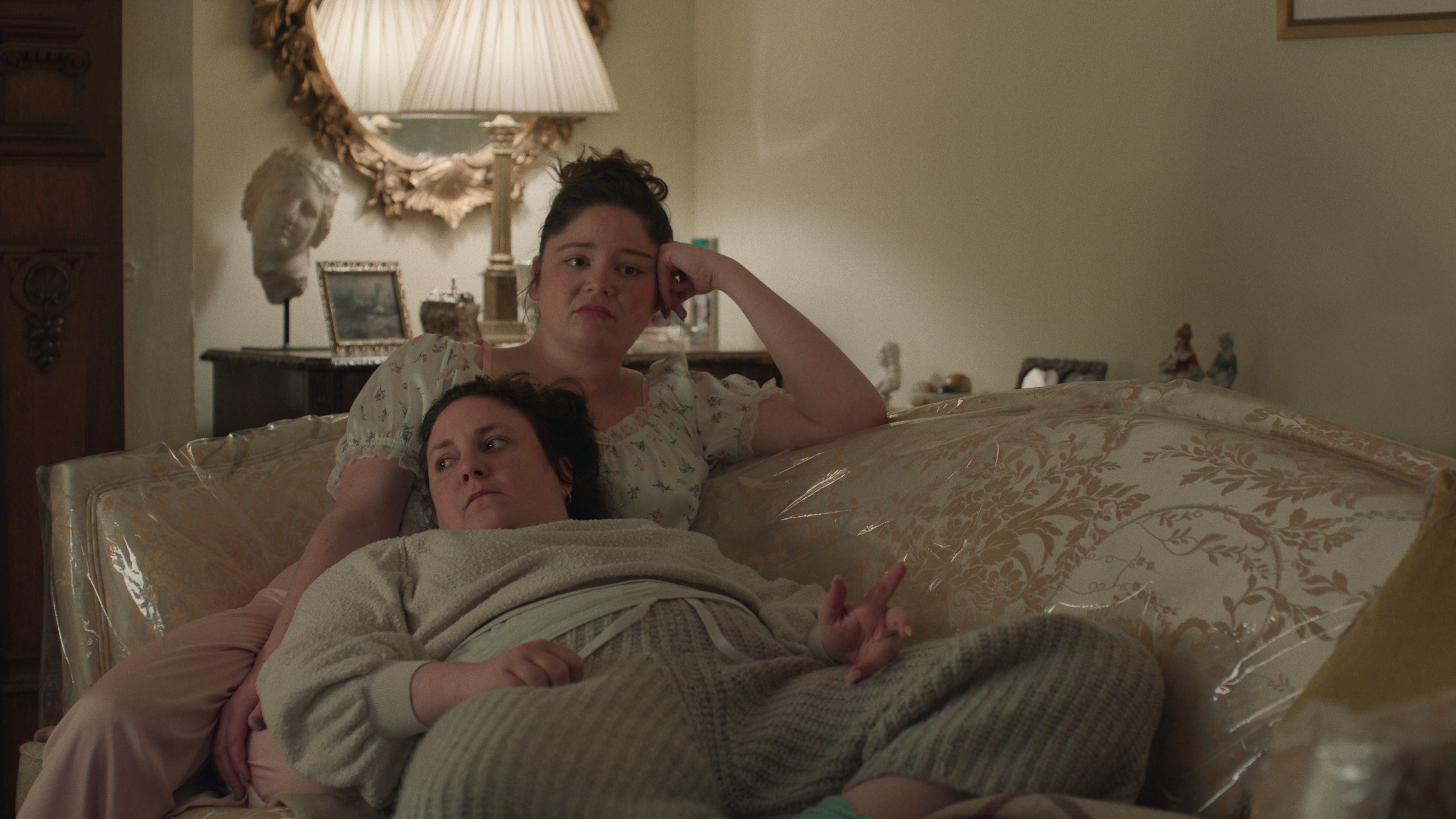 Megan Stalter (top) and Lena Dunham (bottom) star as sisters Jessica and Nora in 'Too Much'