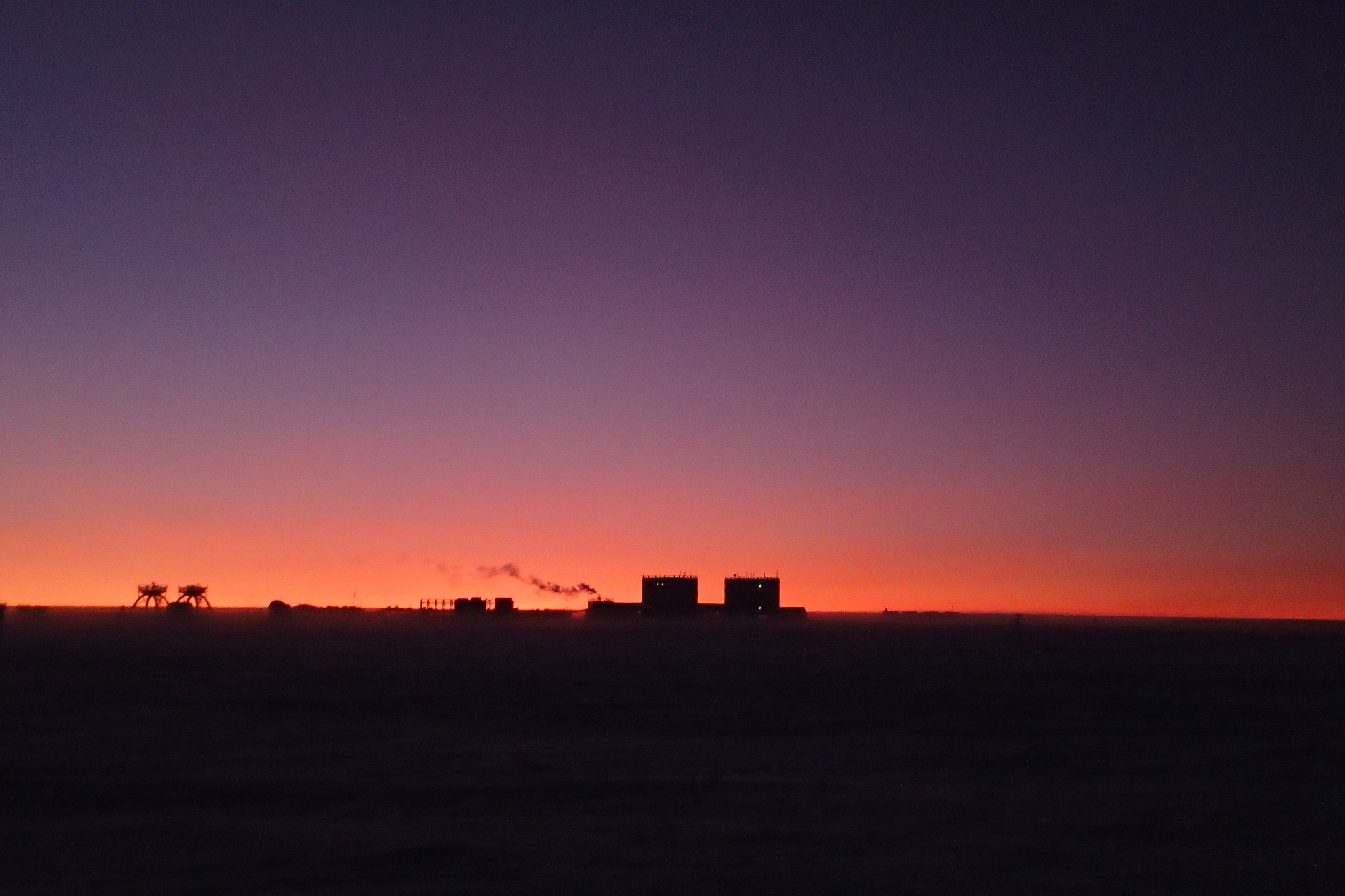 The darkness that the winter-over crew live in has a brief sunrise and sunset each day