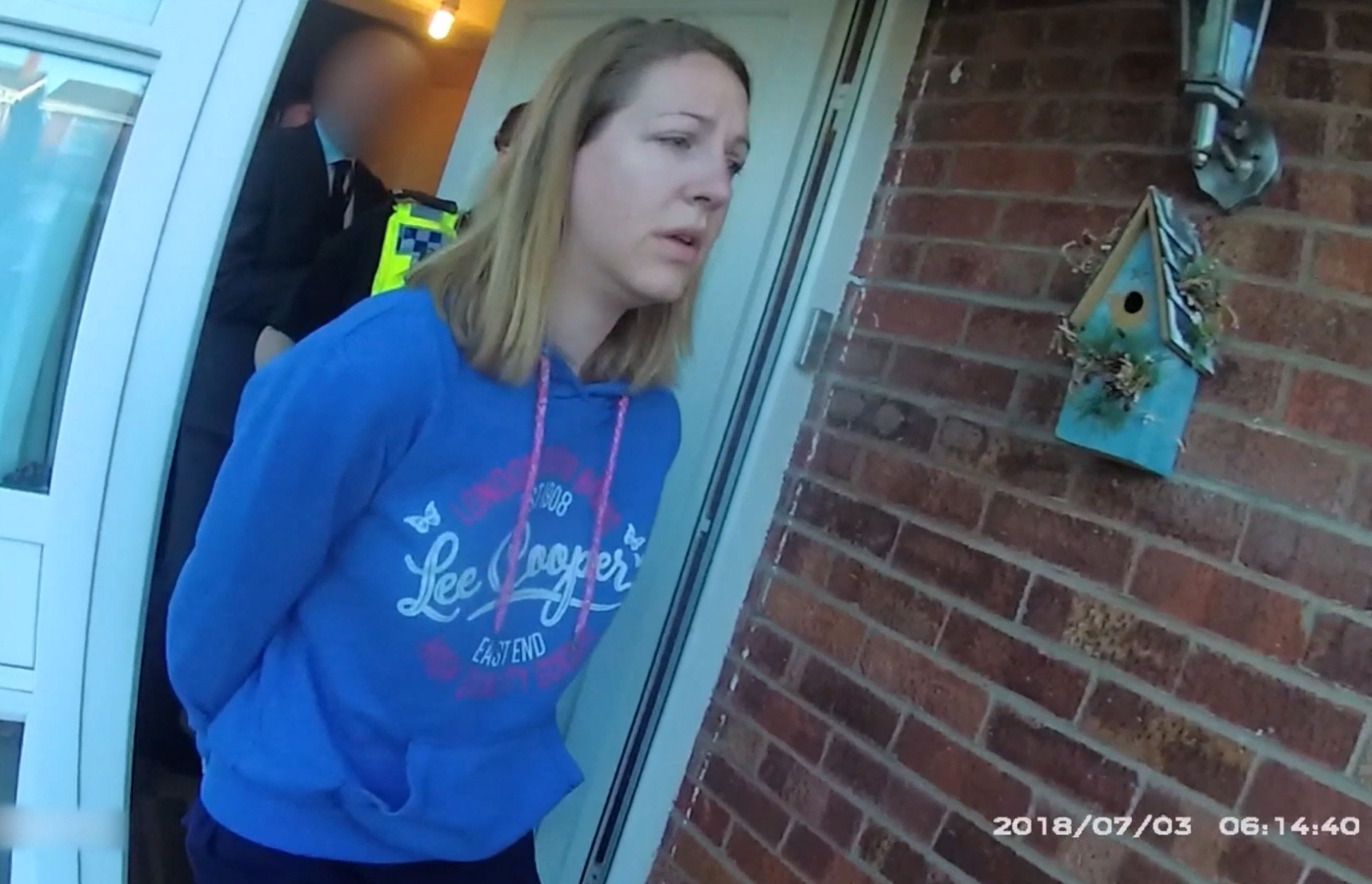 A screengrab of Lucy Letby being arrested in 2018 for murdering babies in her care