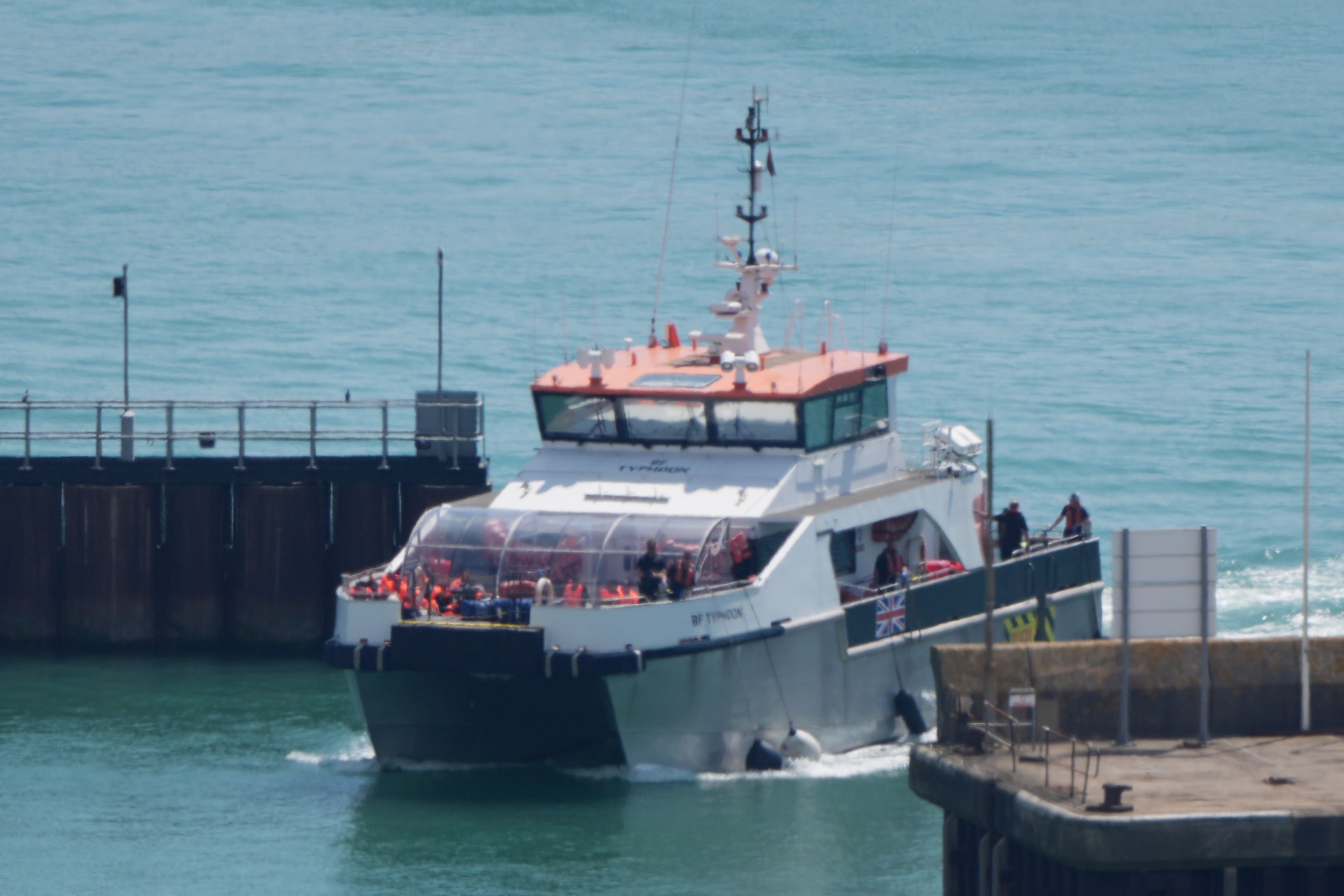 A group of people thought to be migrants are brought in to Dover, Kent, onboard a Border Force vessel following a small boat incident in the Channel. Picture date: Thursday July 10, 2025.