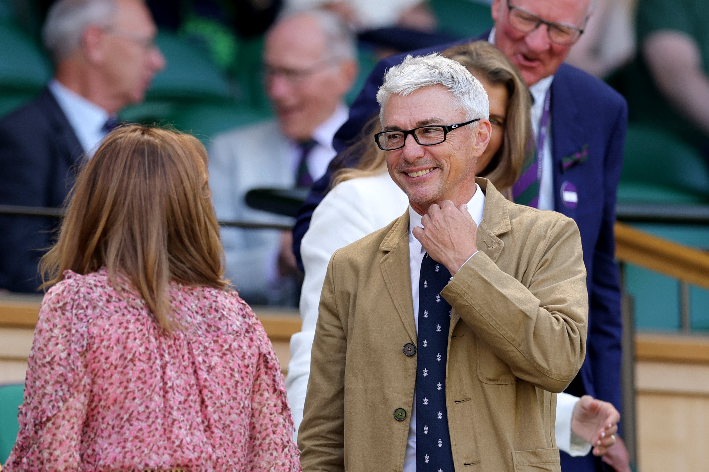 Jonathan Edwards takes a seat in the stands