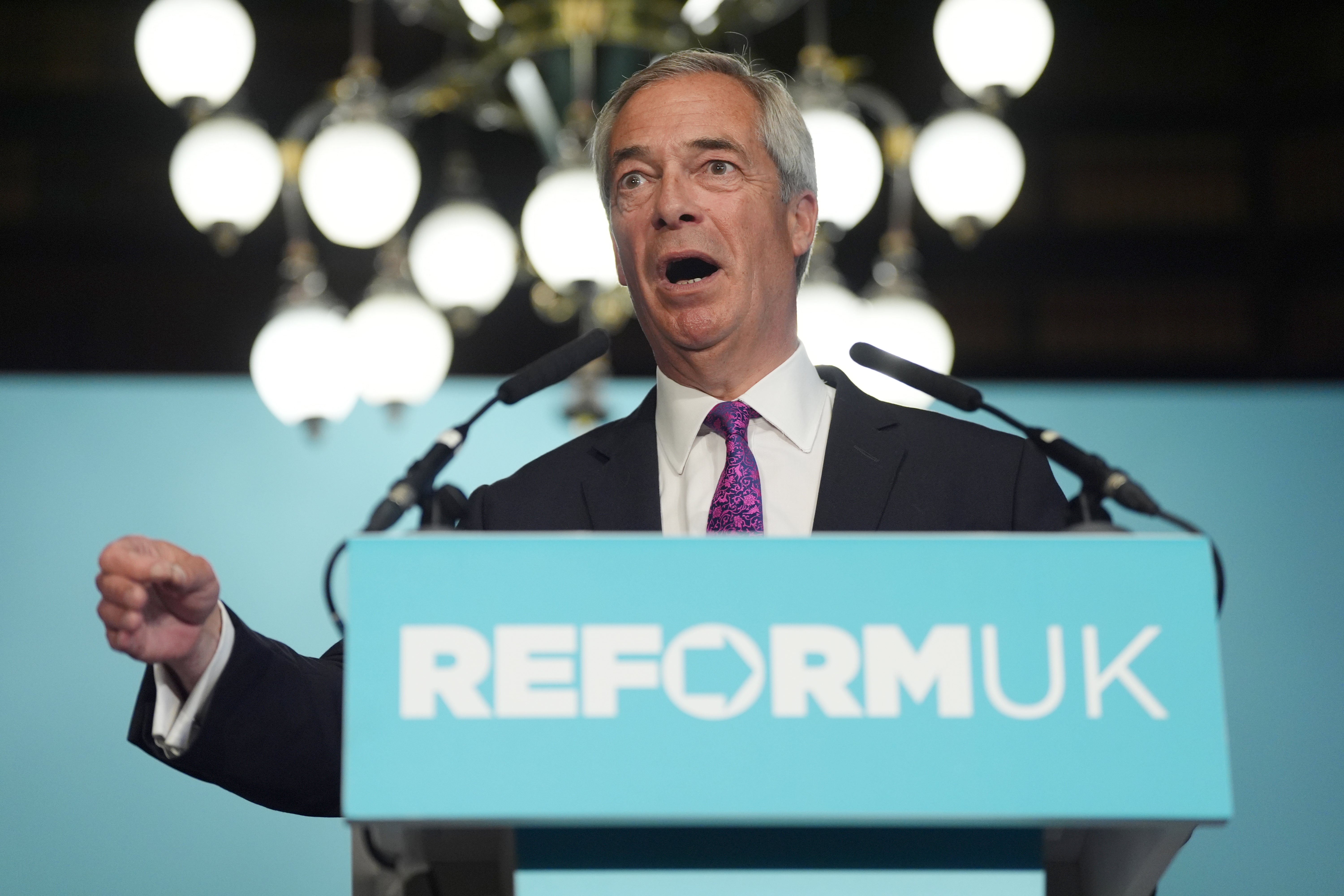Nigel Farage has benefited politically from the small boats issue (Ben Whitley/PA)