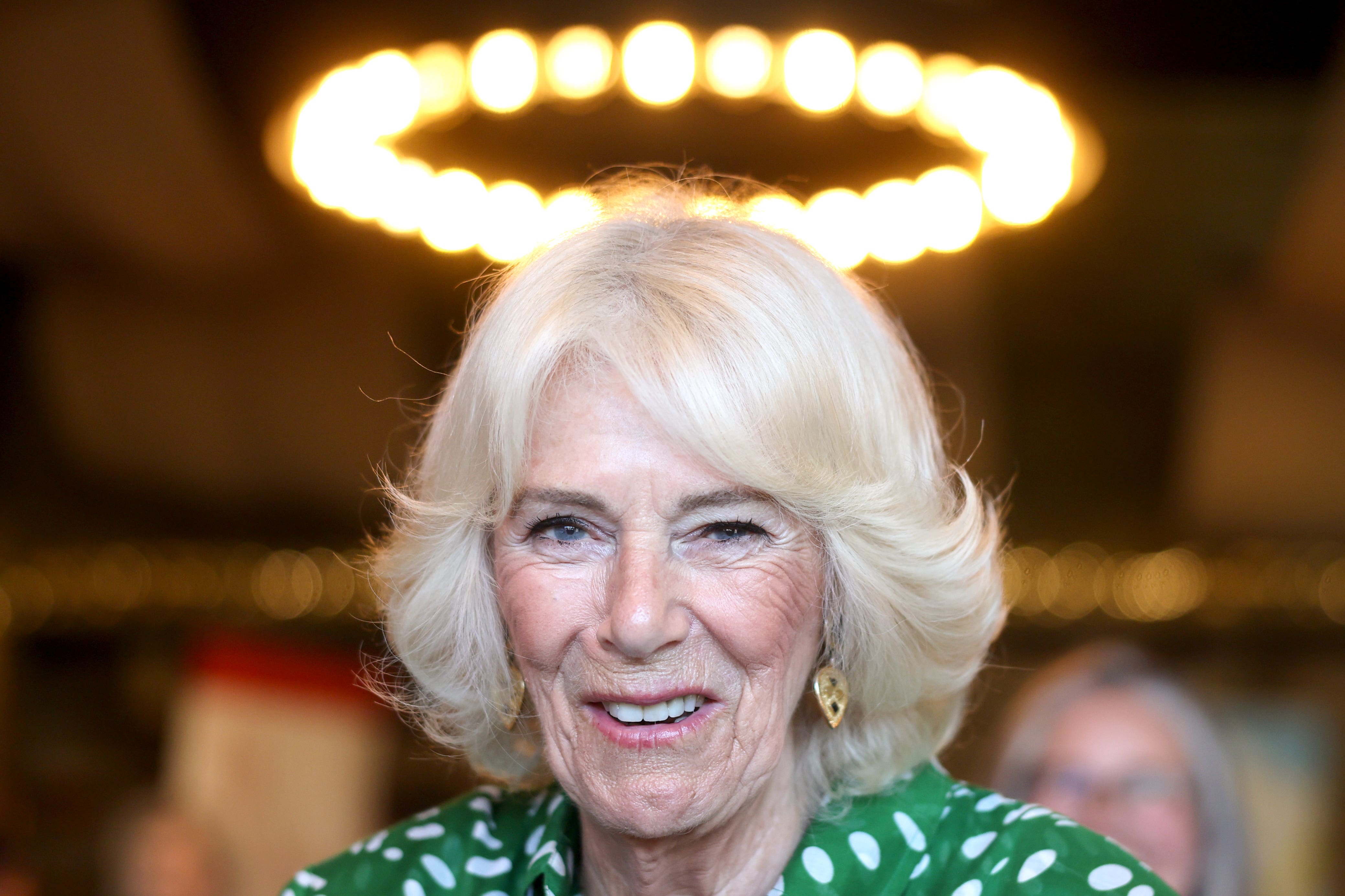 The Queen visited the farm to help youngsters make cupcakes (Chris Jacksom/PA)