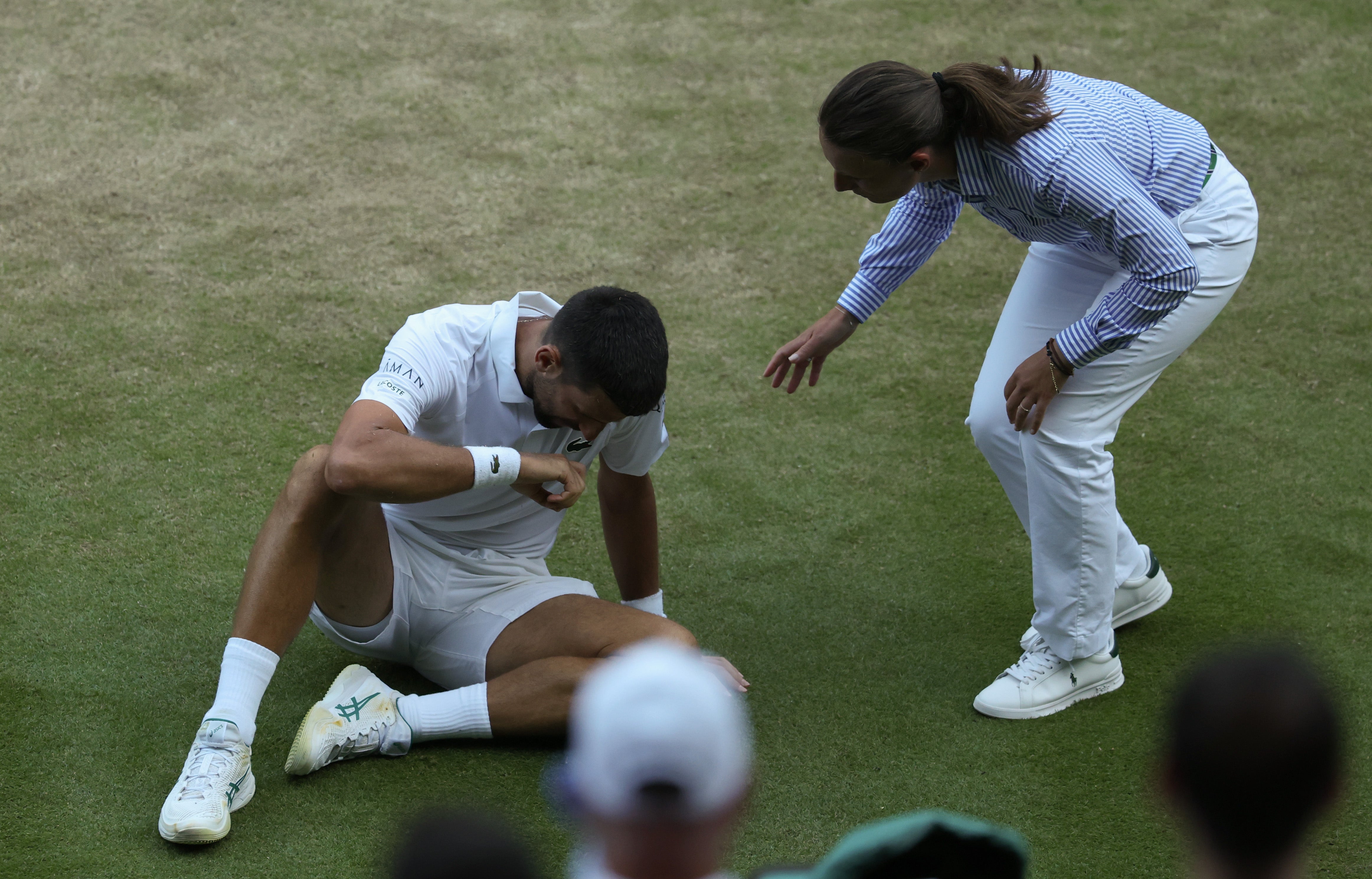 Wimbledon 2025 live: Djokovic an injury doubt for semi-finals after Swiatek and Anisimova set up women’s final