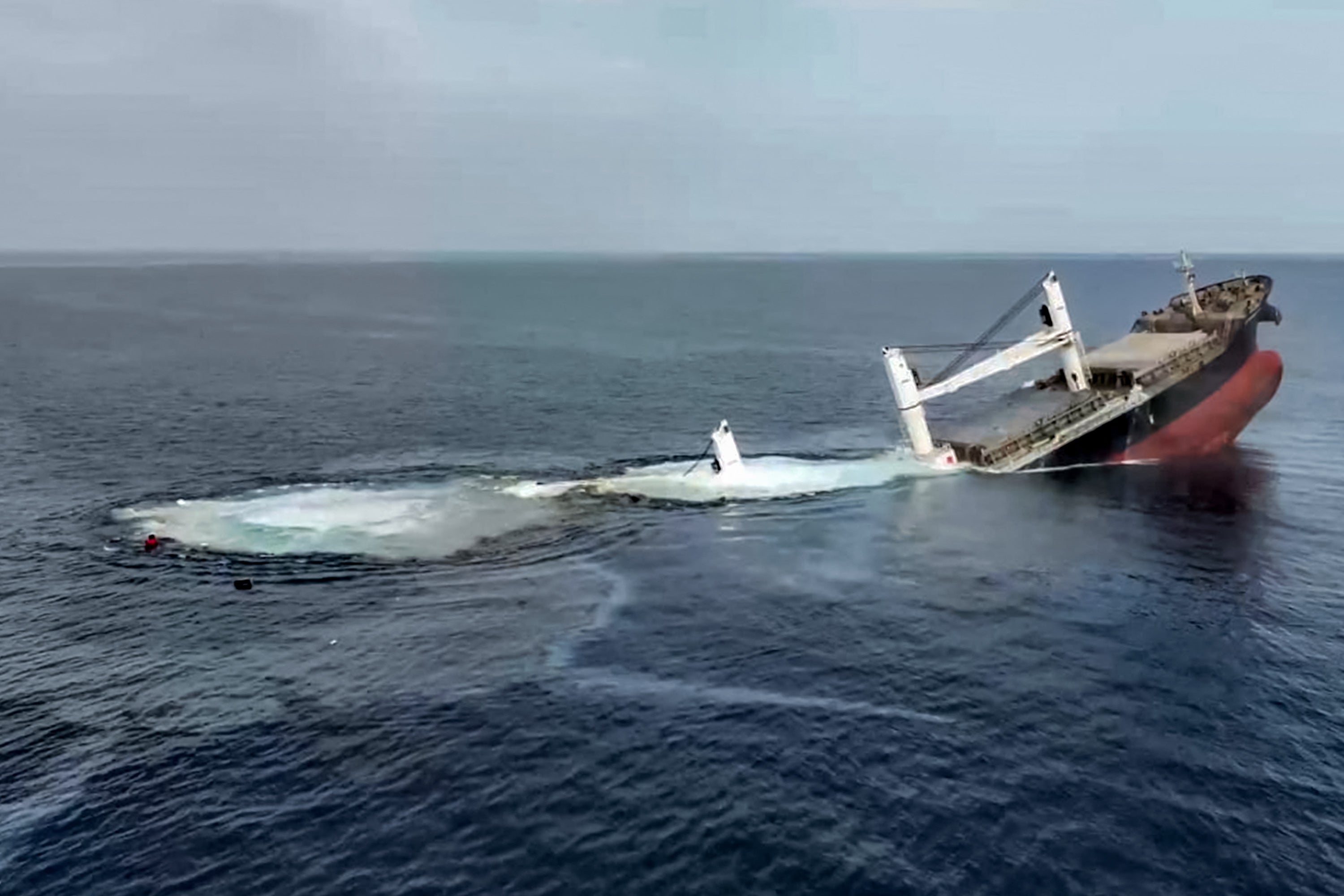 The ship sinking after it was attacked by the Houthis at sea