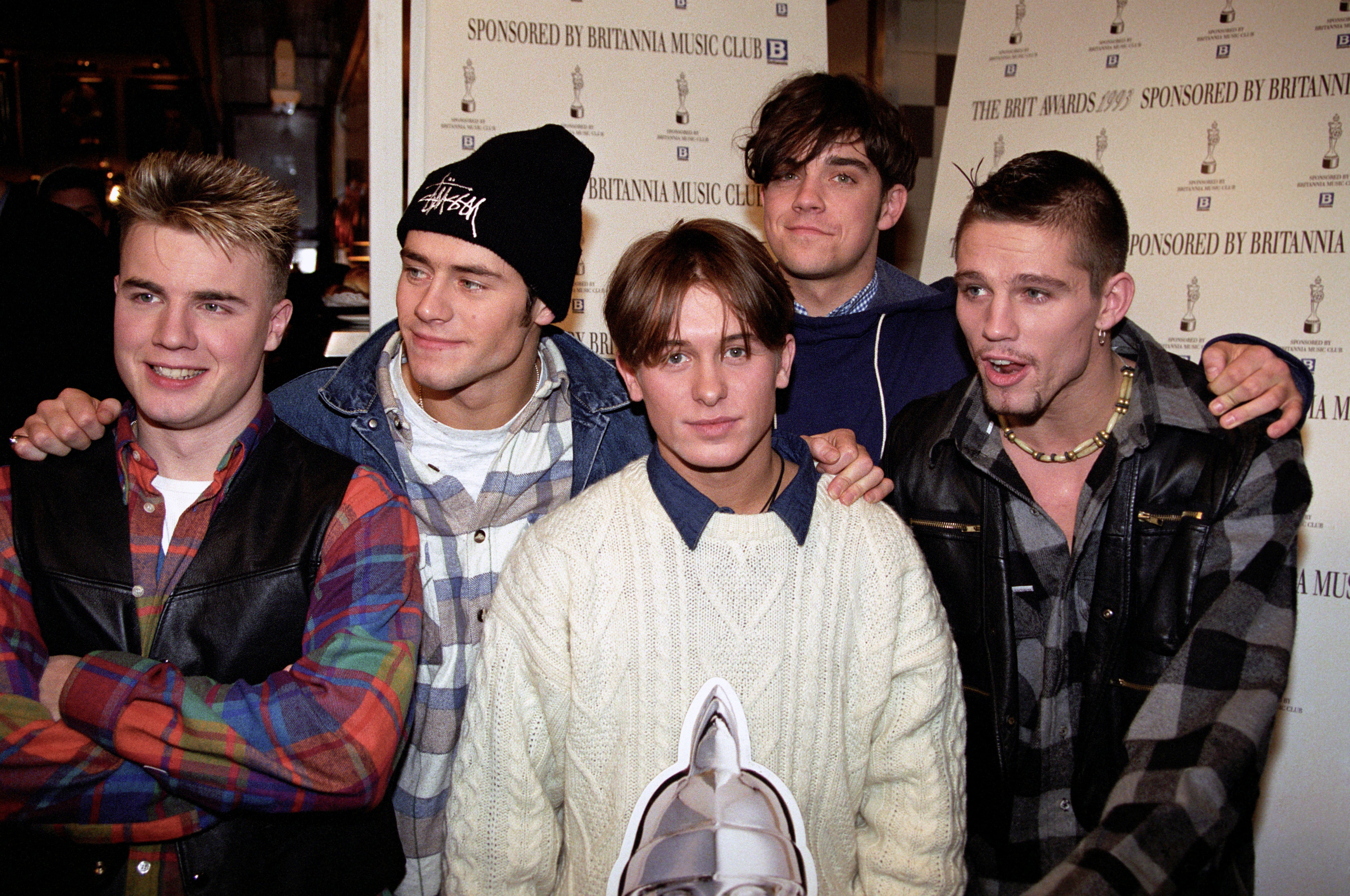 Five uneasy pieces: (from left) Gary Barlow, Howard Donald, Mark Owen, Williams and Jason Orange during Take That’s heyday