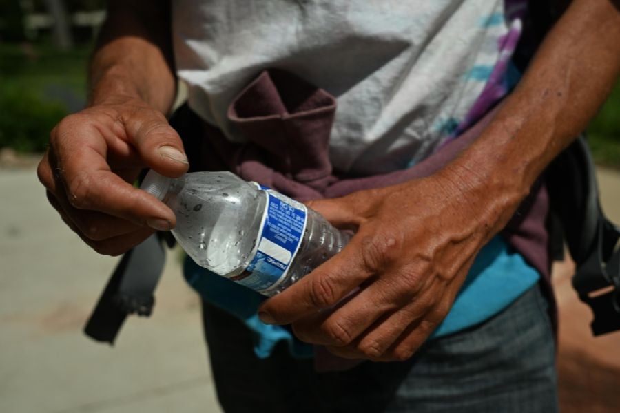 An Arizona man is handing out bottled water to neighbors in extreme heat. His HOA is fining him $100 every time