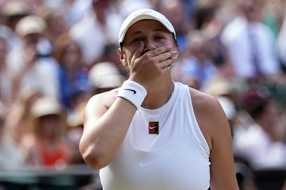 Amanda Anisimova covers her mouth in disbelief after beating Aryna Sabalenka (Jordan Pettitt/PA)
