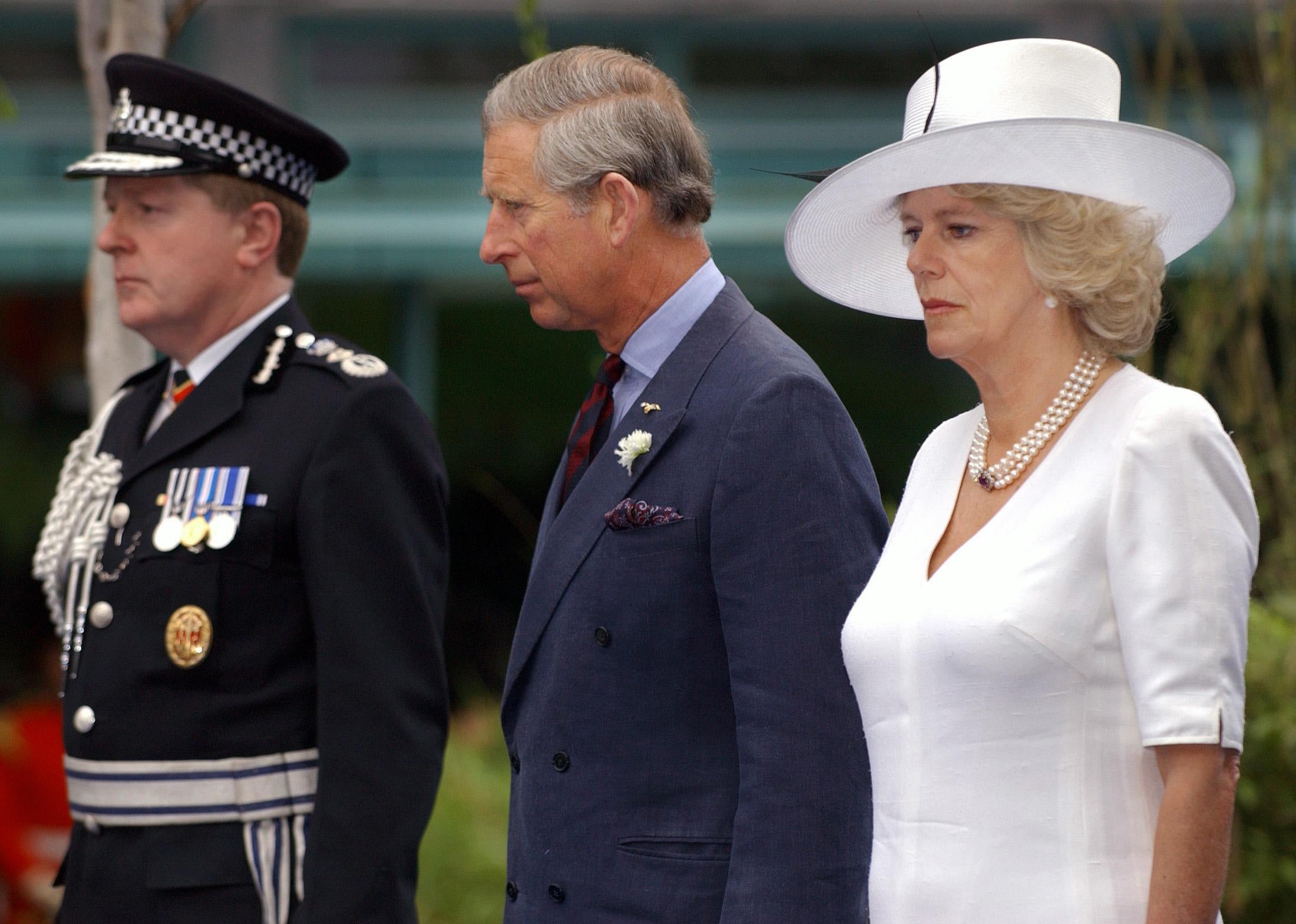 Then Prince of Wales and the Duchess of Cornwall alongside the Metropolitan Police Commissioner Sir Ian Blair