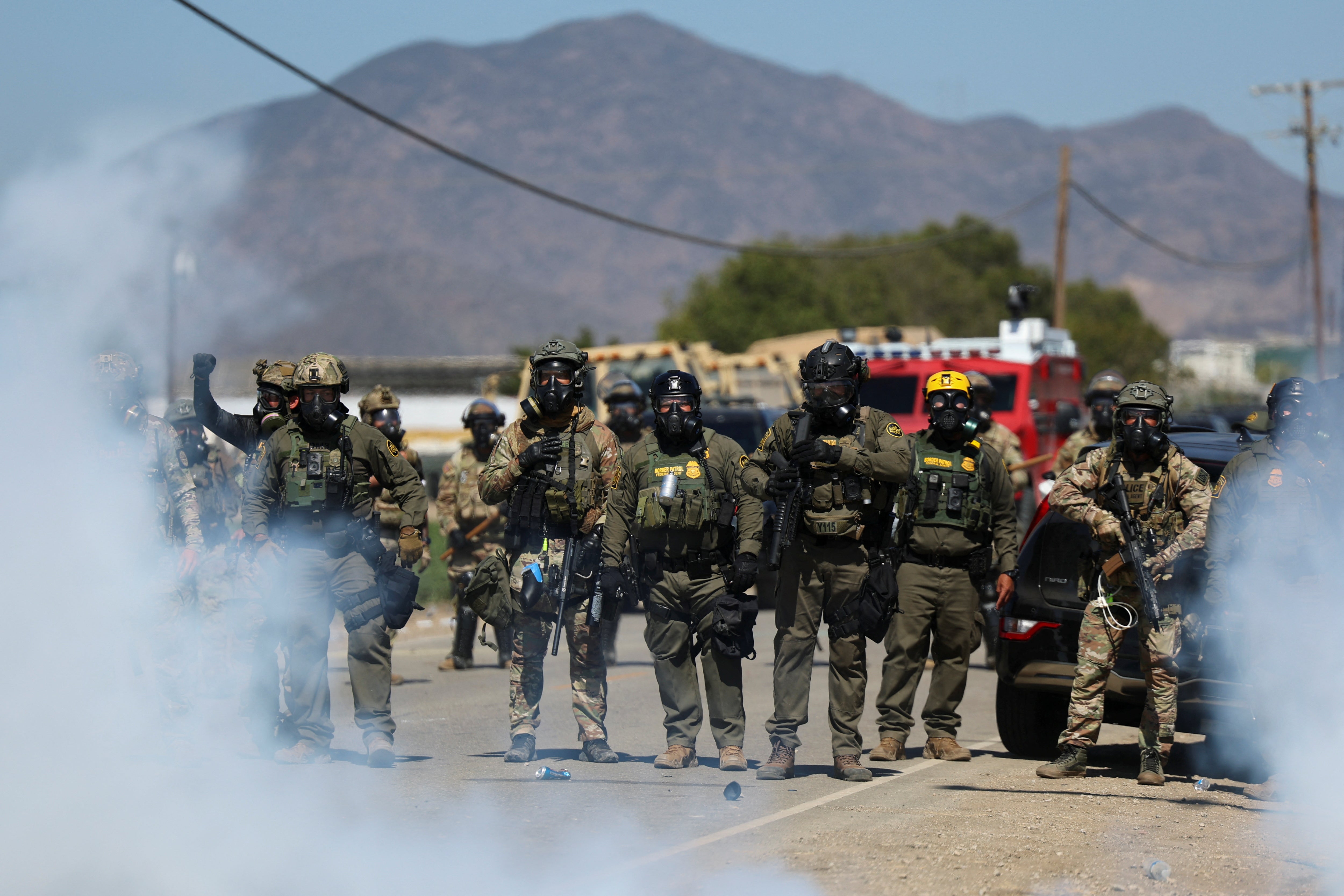 Federal agents descended on crowds of protesters demonstrating against immigration raids at two cannabis farms in southern California on Thursday. Several were hospitalized during the raid, and one worker has died