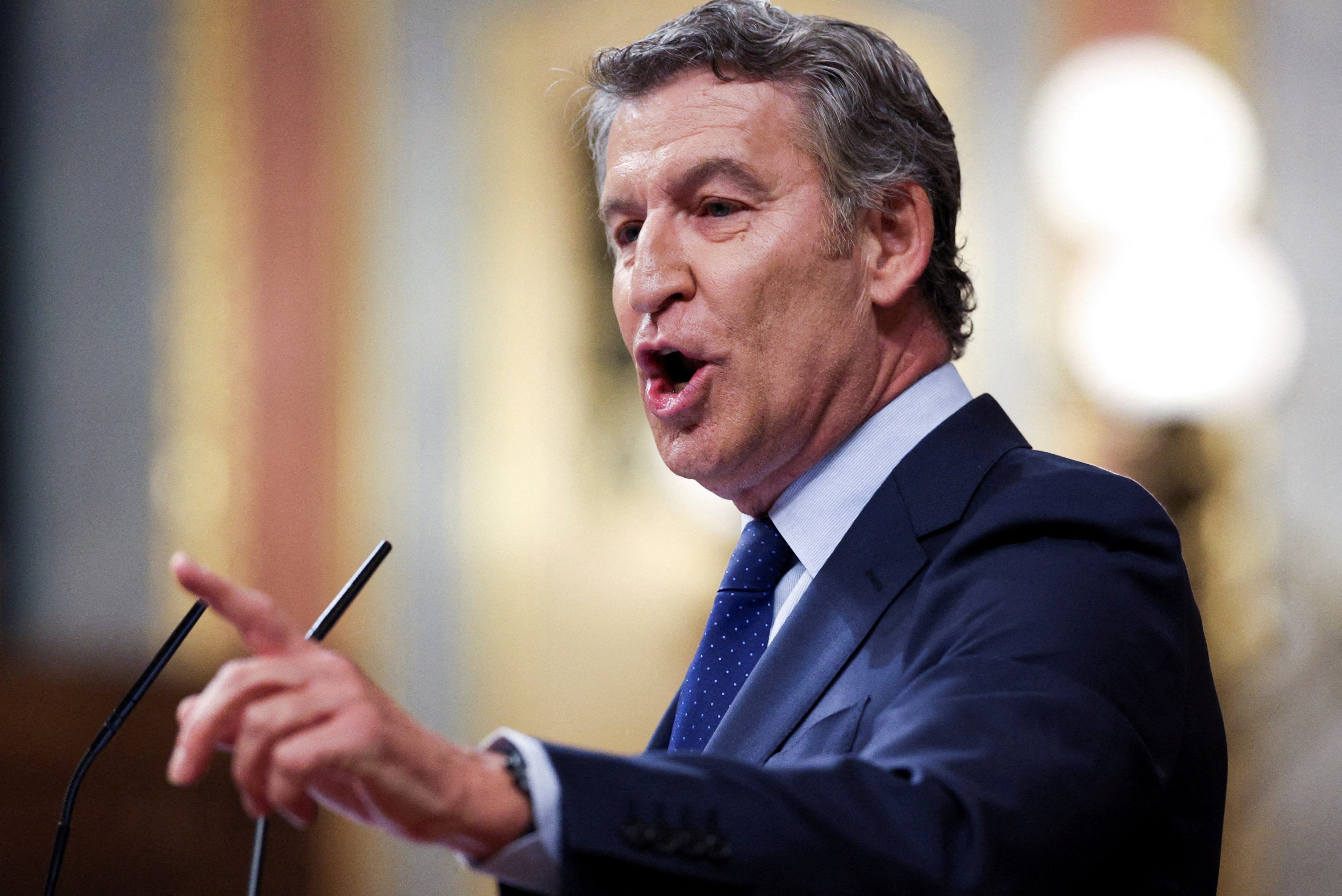 Spain's opposition leader Alberto Nunez Feijoo addresses Prime Minister Pedro Sanchez in parliament