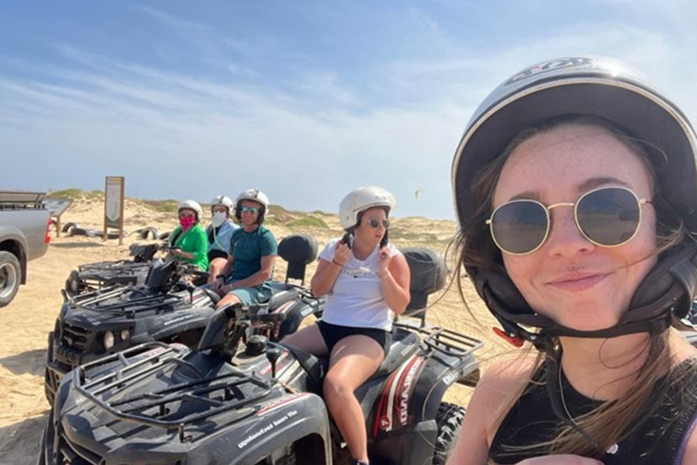 Tony Holliday (third right) with his daughters Keeley (second right) and Rhianna (right) on holiday in Cape Verde (Tony Holliday/Scala/PA)