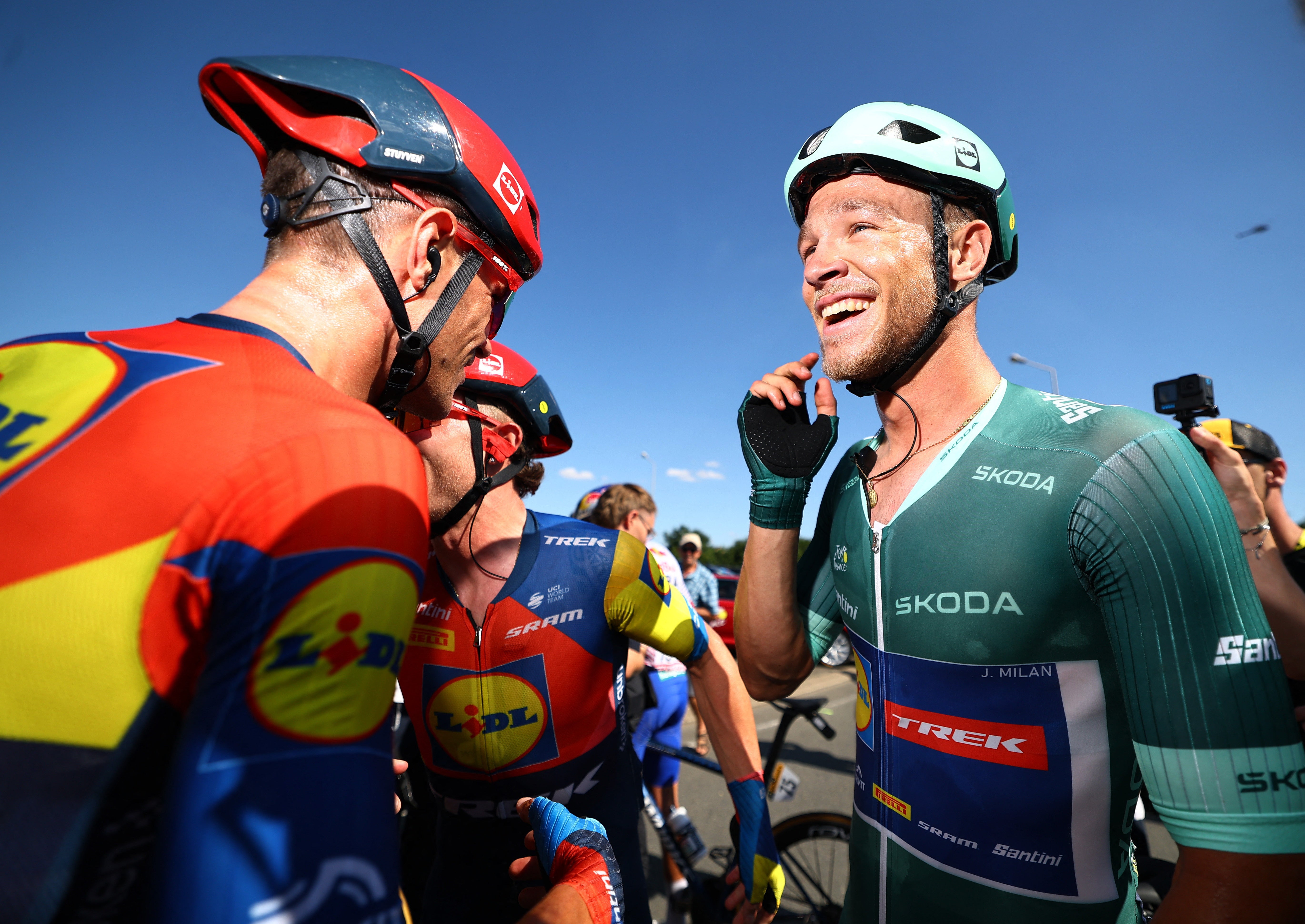 Lidl - Trek's Jonathan Milan celebrates with Lidl - Trek's Edward Theuns after winning stage 8