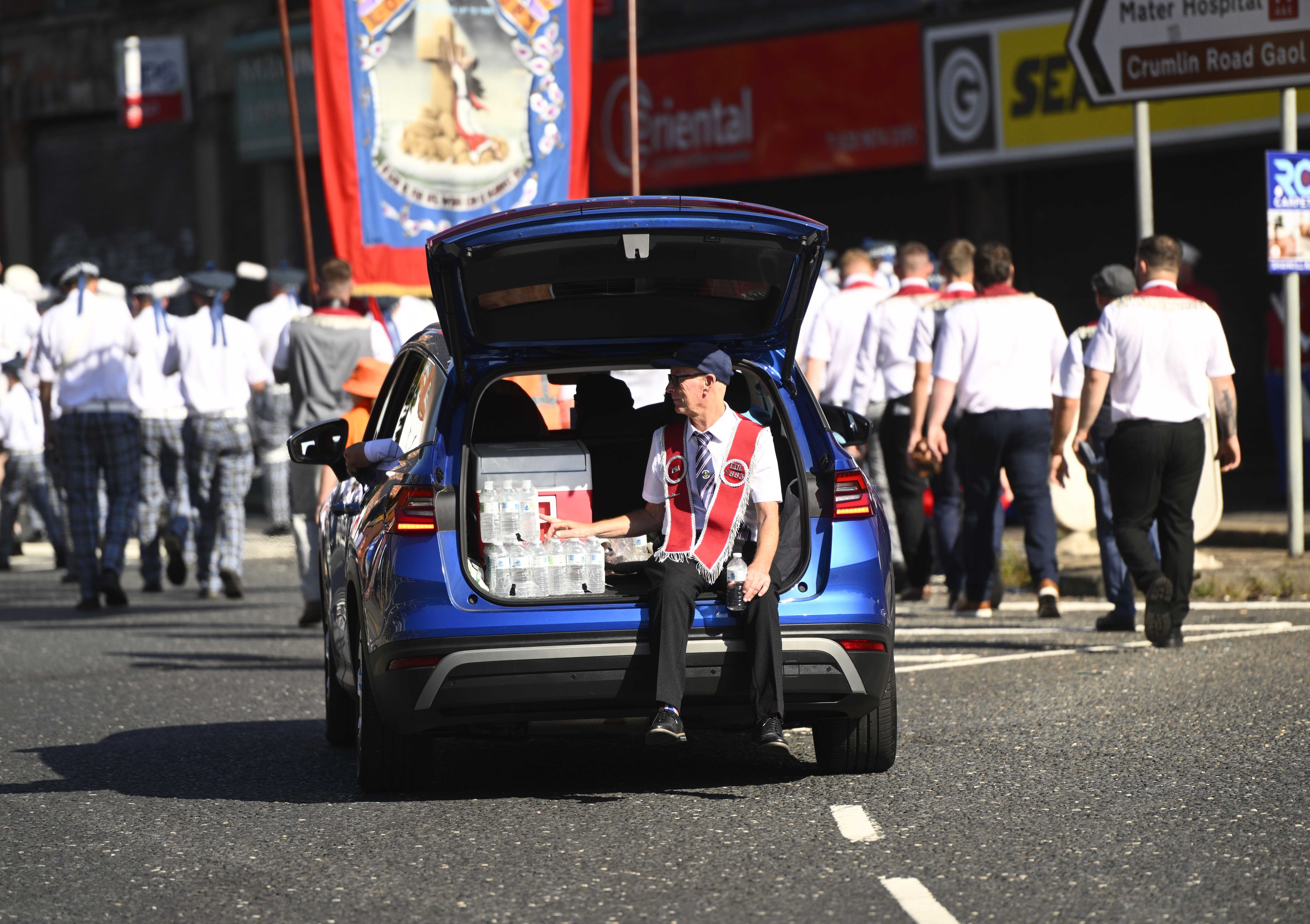 A car carrying water bottles during a Twelfth of July parade in Belfast