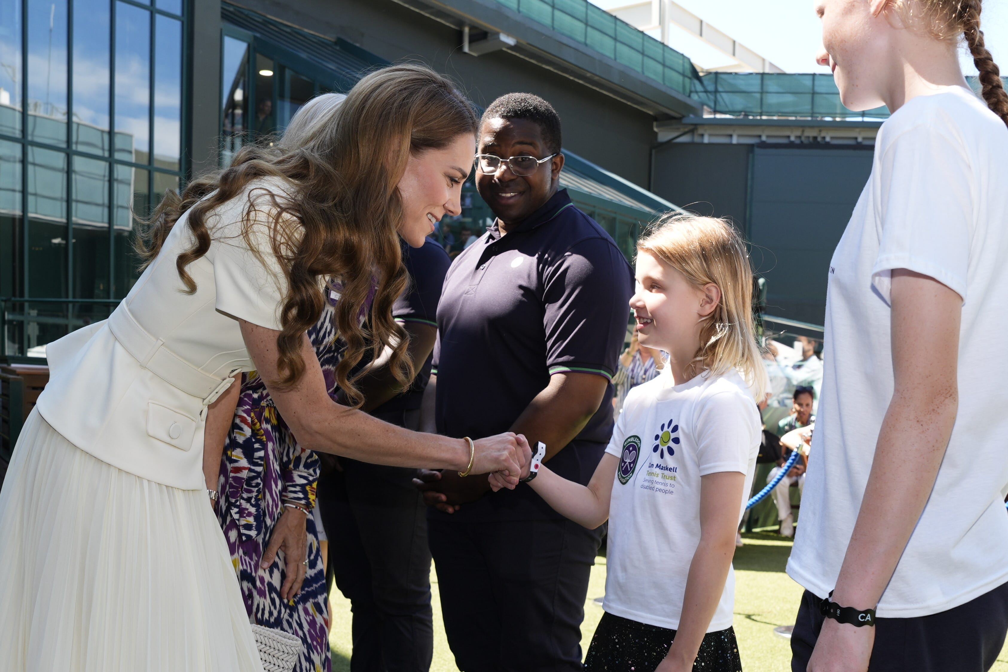 The Princess of Wales meeting Lydia Lowe, eight, from the Dan Maskell Tennis Trust (Jordan Pettitt / PA).