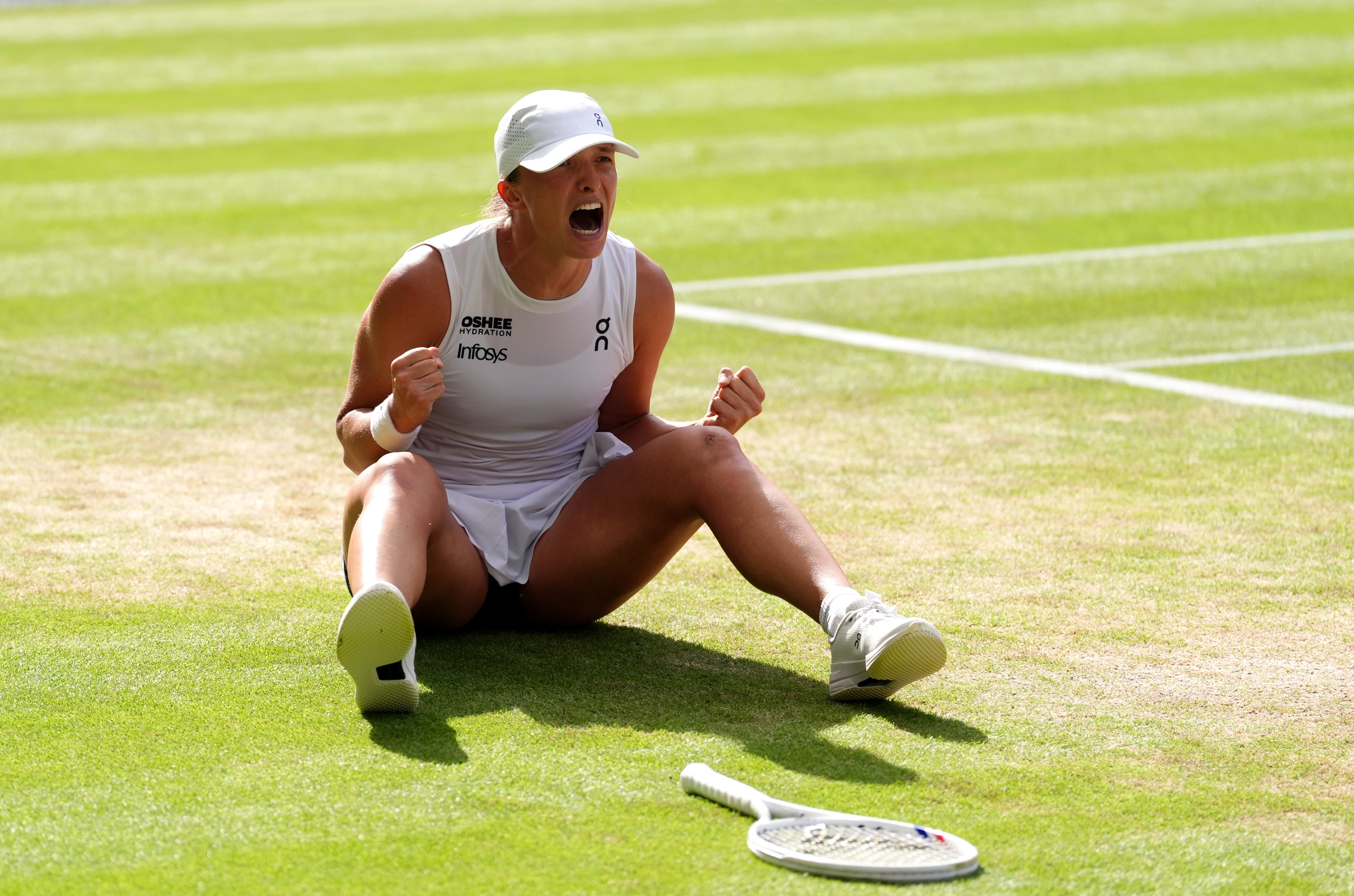 Iga Swiatek celebrates victory (Adam Davy/PA)