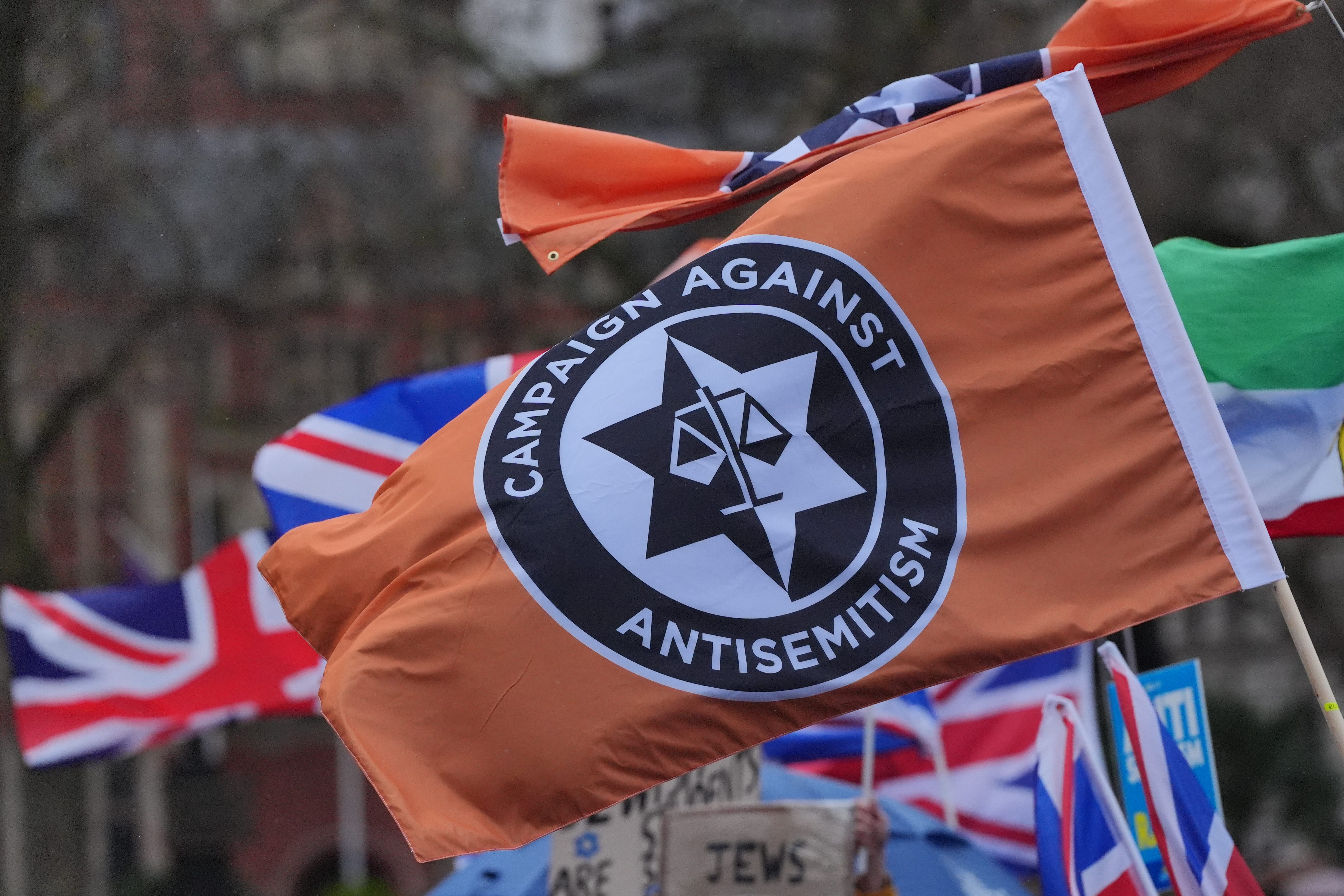 People in Parliament Square during a Campaign Against Antisemitism march and rally in central London. (Jonathan Brady/PA)
