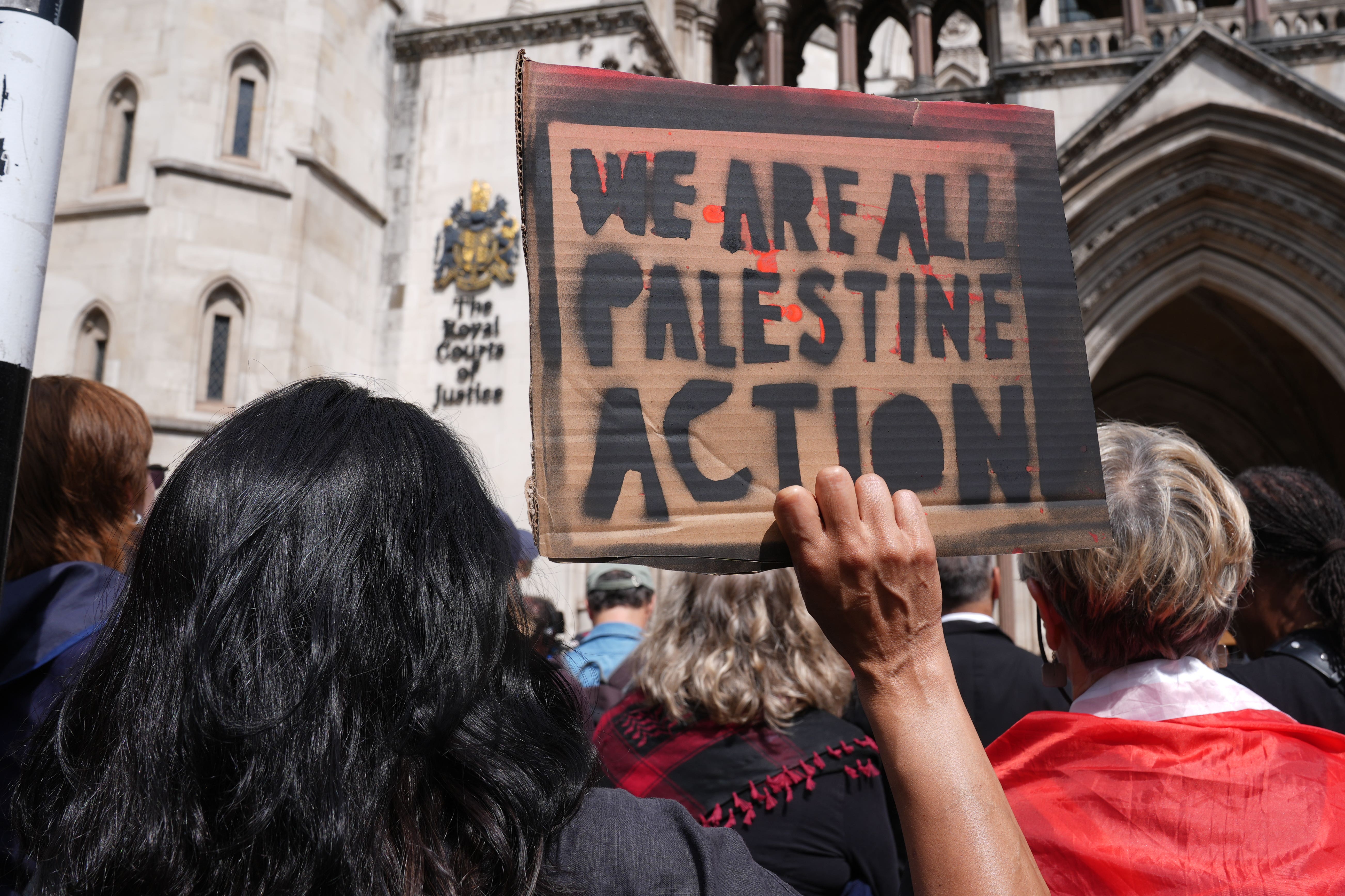 Protesters outside the Royal Courts of Justice on The Strand, central London, where a hearing took place over whether the proscribing of Palestine Action should be temporarily blocked (Lucy North/PA)
