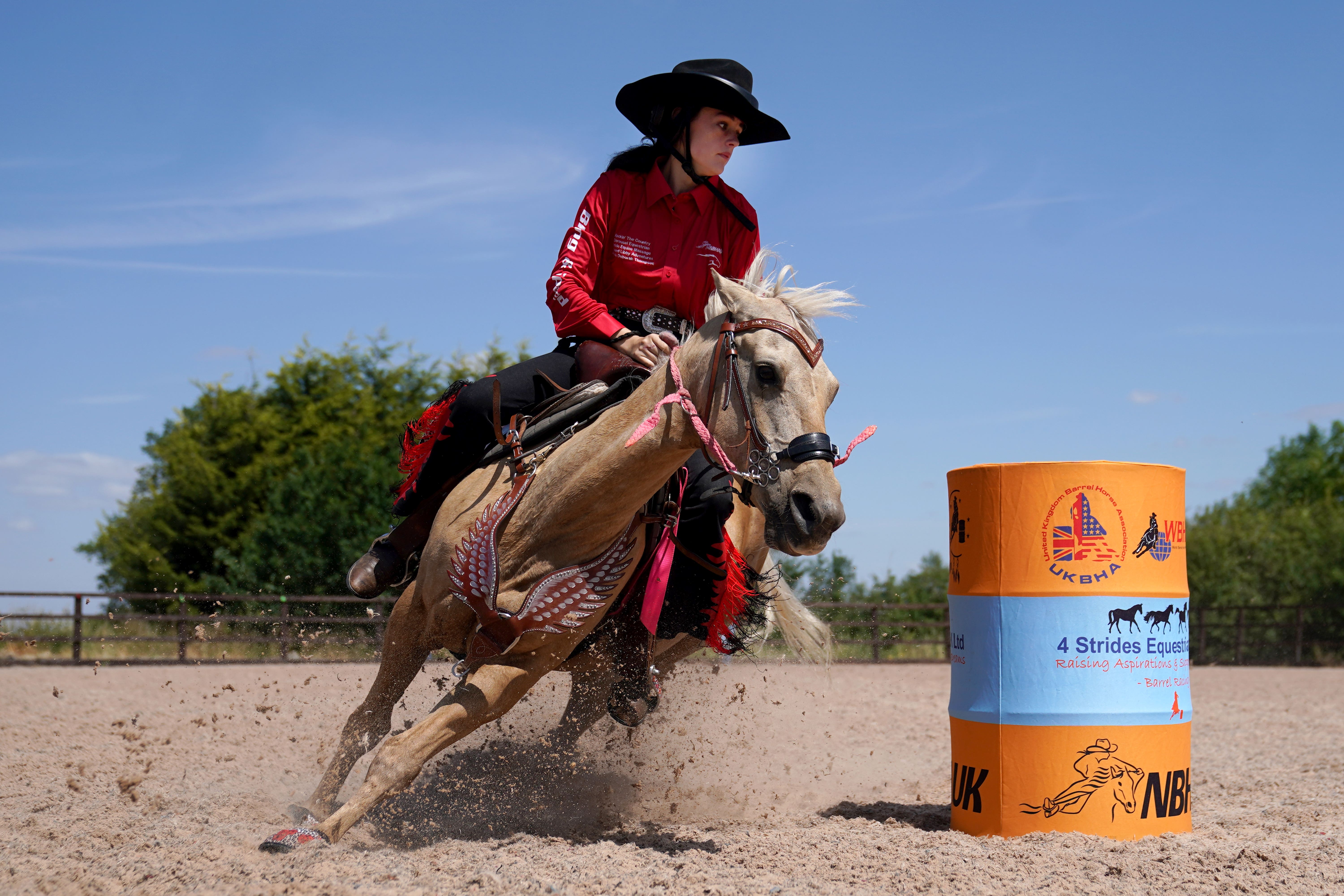 Barrel racer Eloisa Atkinson, 15, on her pony Peaches during a training session at 4 Strides Equestrian UK in Fulbeck, Lincolnshire (Joe Giddens/PA)