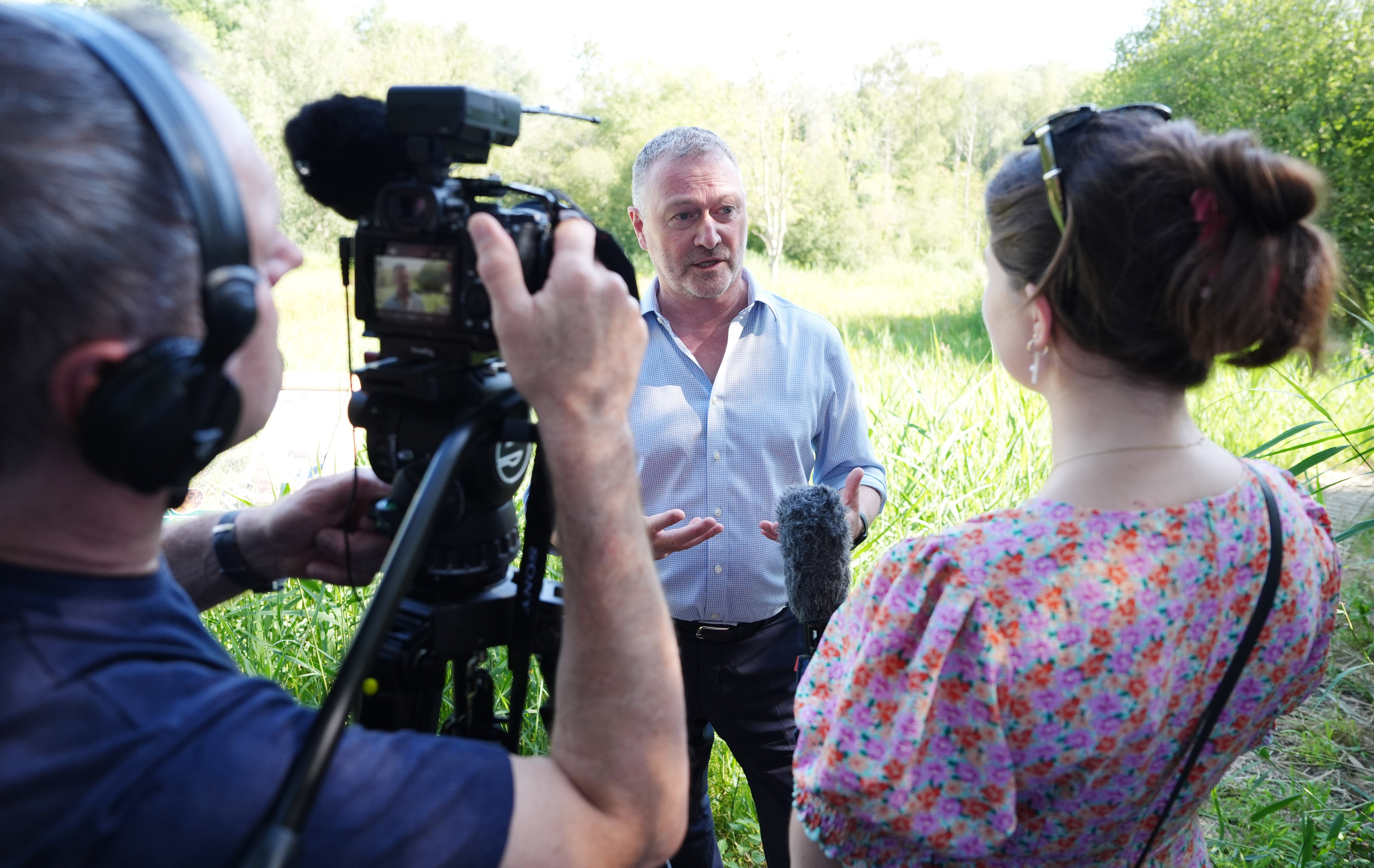 Environment Secretary Steve Reed speaks to the media at the Ock and Thame Farmers floodplain restoration project (Jonathan Brady/PA)