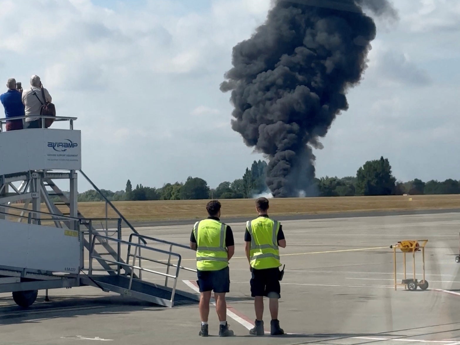 A plume of black smoke rises near Southend runway following small plane crash
