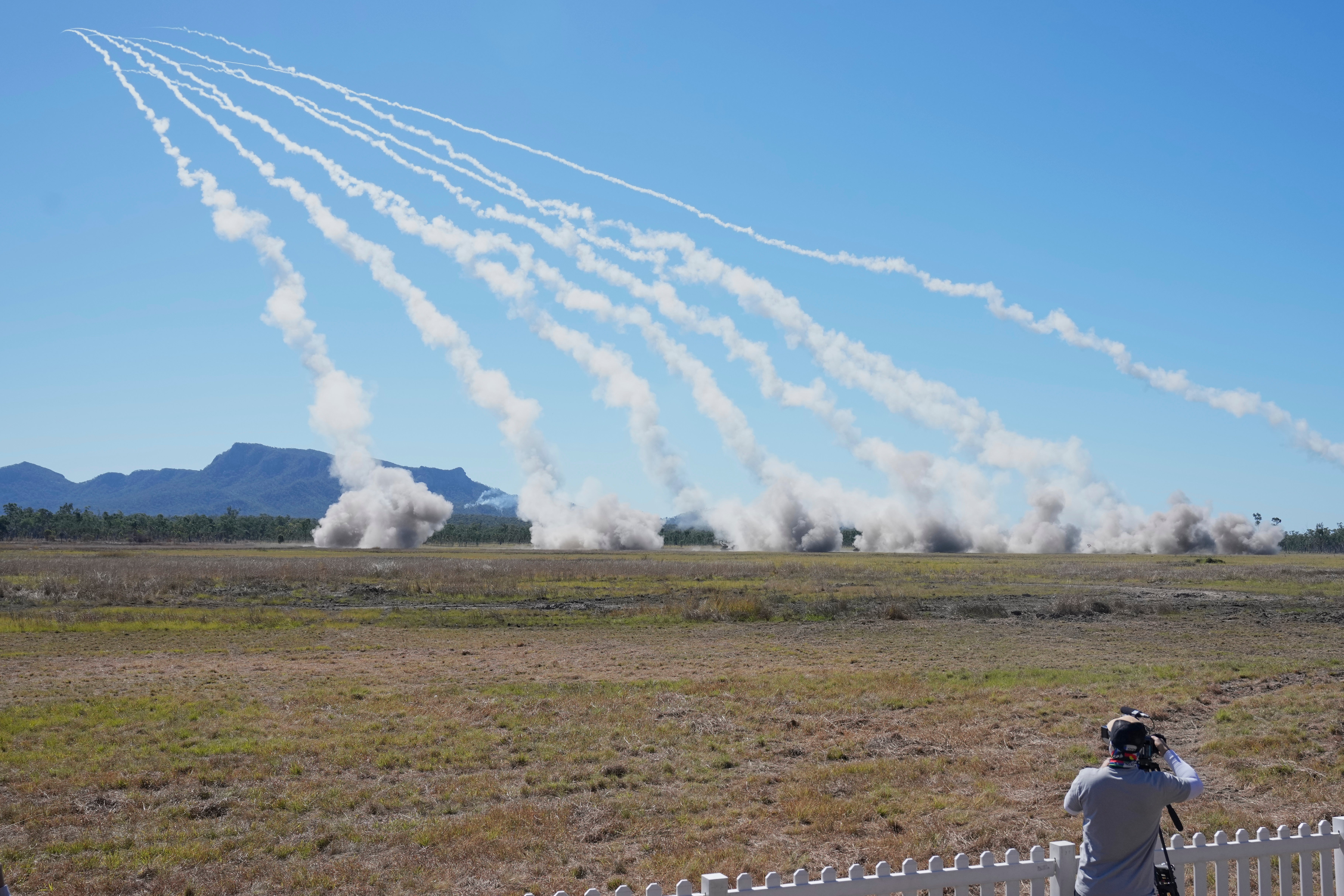 Rockets are launched from a High Mobility Artillery Rocket System during Exercise Talisman Sabre 2025, Australia's largest-ever war fighting drills at Shoalwater Bay Training Area, near Rockhampton, Australia, Monday, July 14, 2025