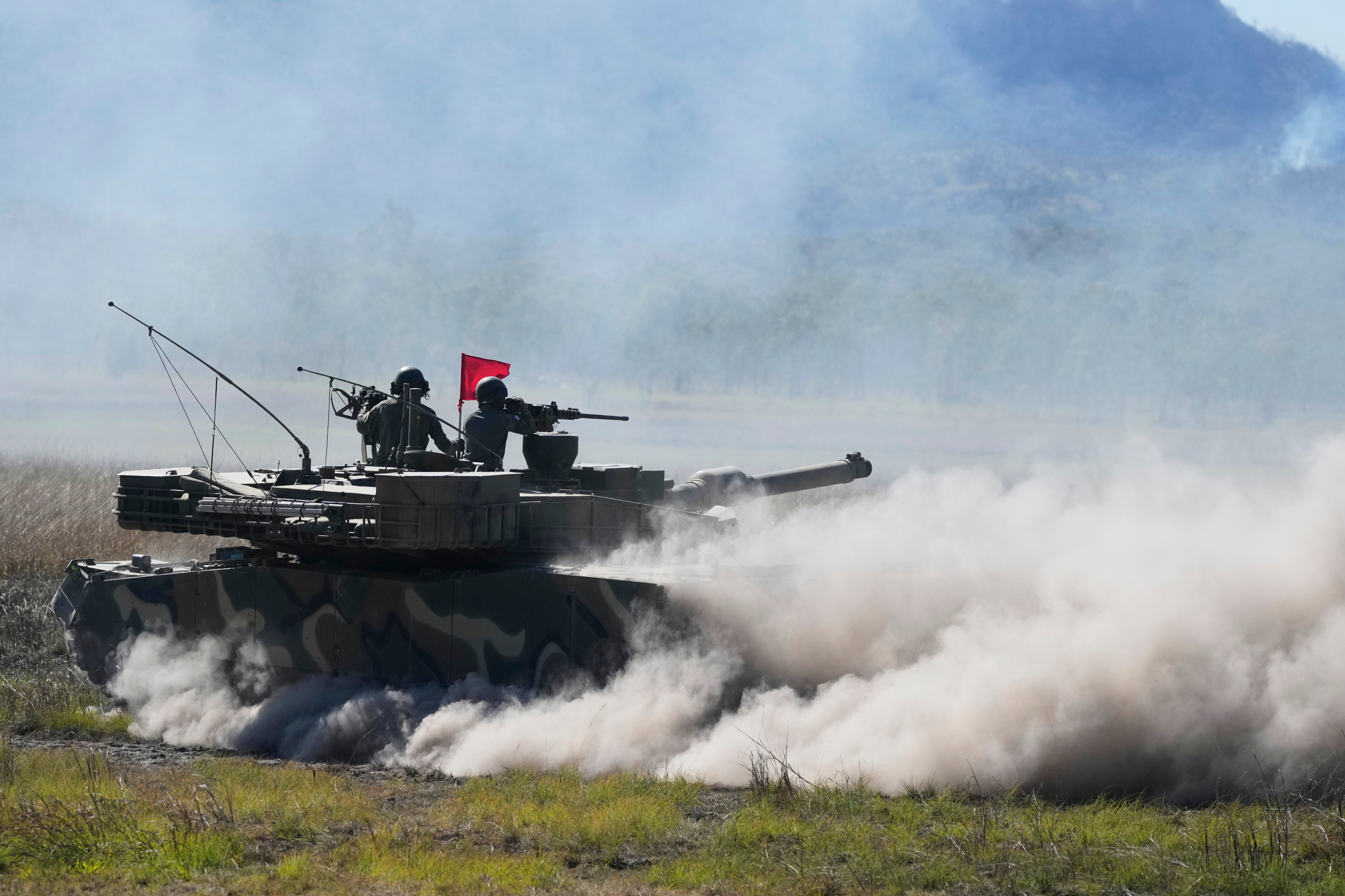 South Korean soldiers fire from a K1 tank during Exercise Talisman Sabre 2025, Australia's largest-ever war fighting drills at Shoalwater Bay Training Area, near Rockhampton, Australia, Monday, July 14, 2025