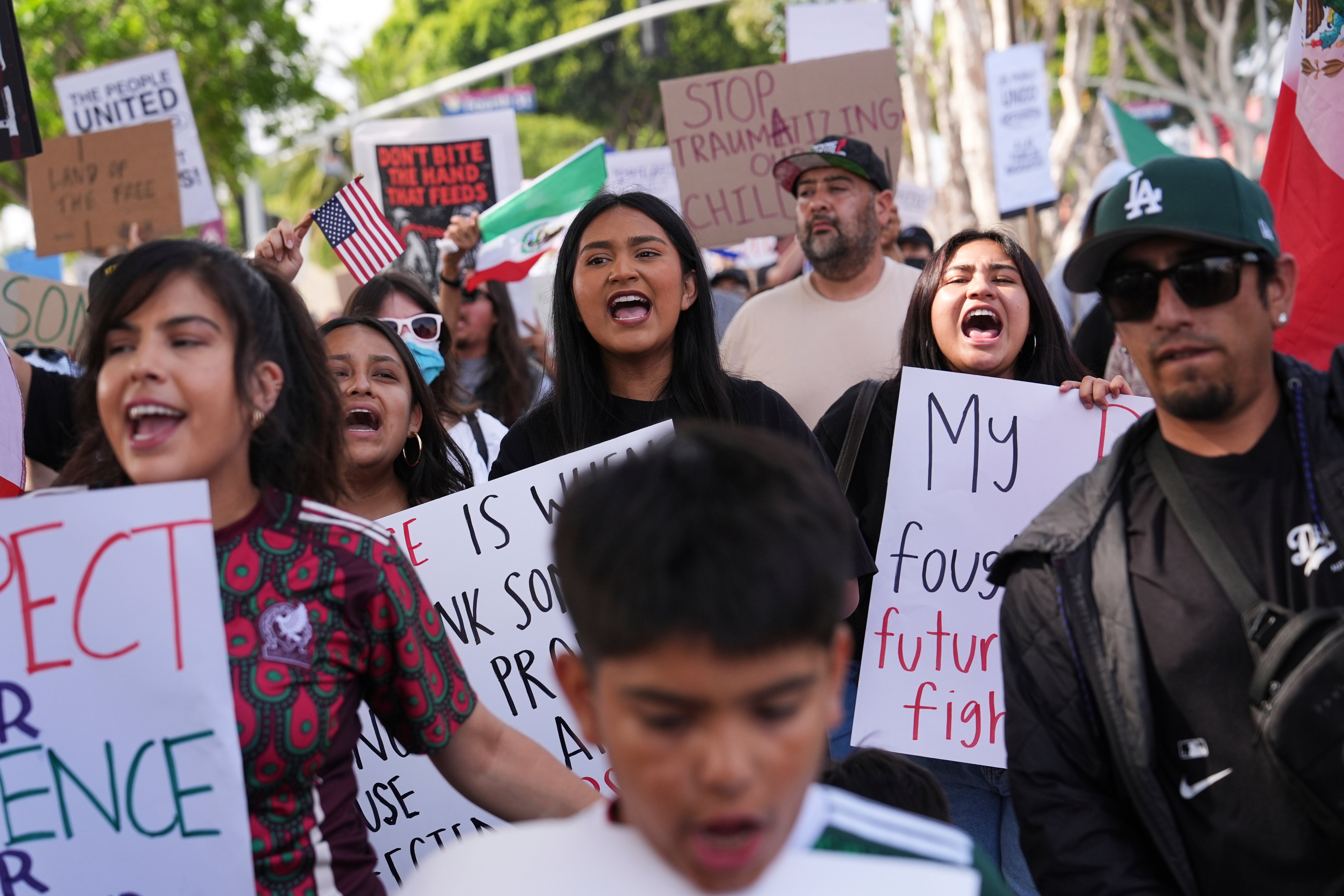 Demonstrators march during a protest in reaction to recent immigration raids in Oxnard, California