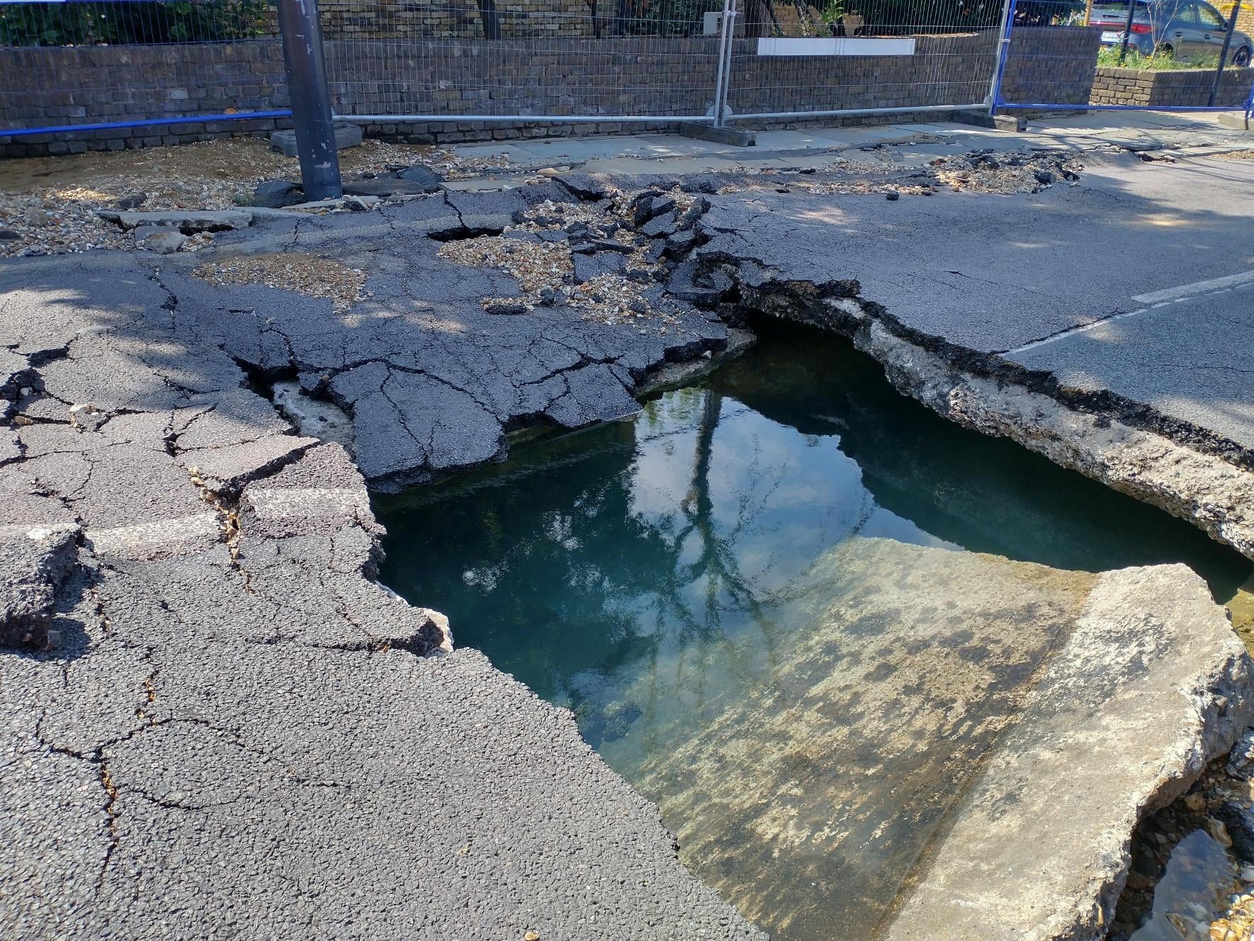 Thames Water said a burst pipe caused significant flooding near Clapham Common