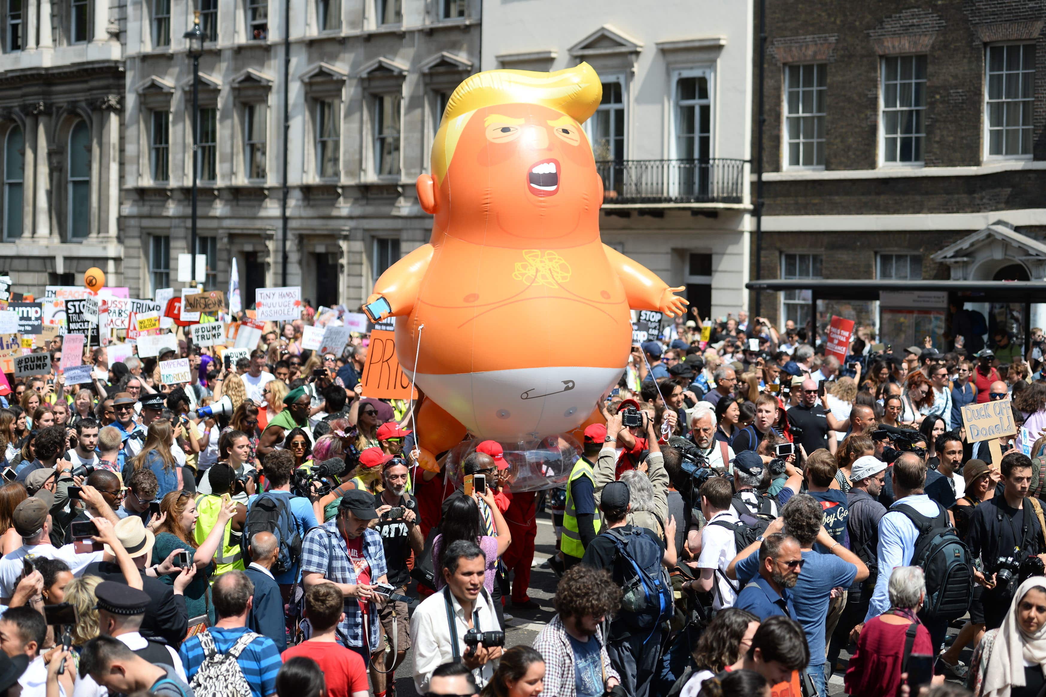 The ‘Trump Baby’ balloon joins demonstrators as they march to Parliament Square in 2018 (Kirsty O’Connor/PA)