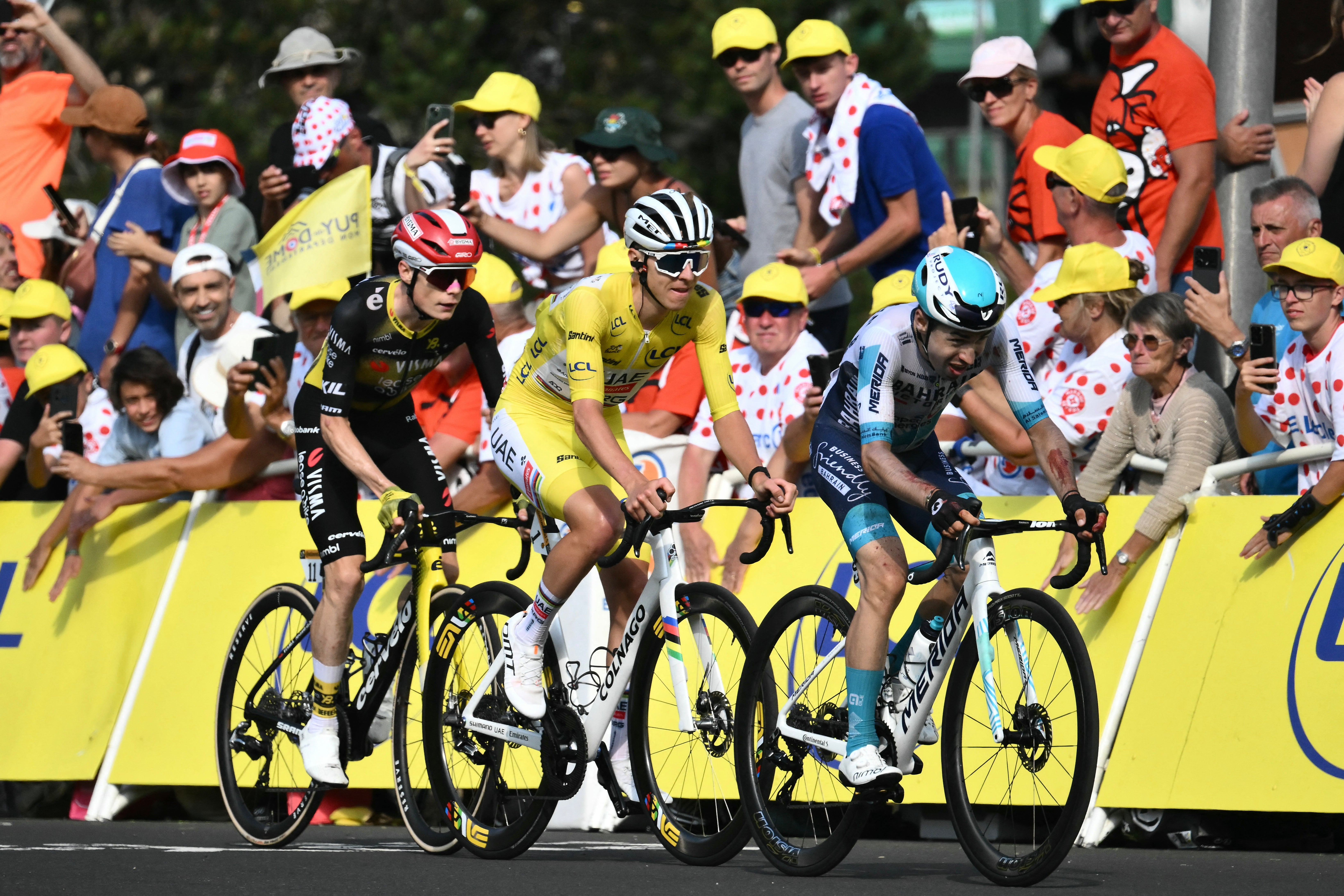 Pogacar and Vingegaard rode across the line together on stage 10 (along with Lenny Martinez, right)
